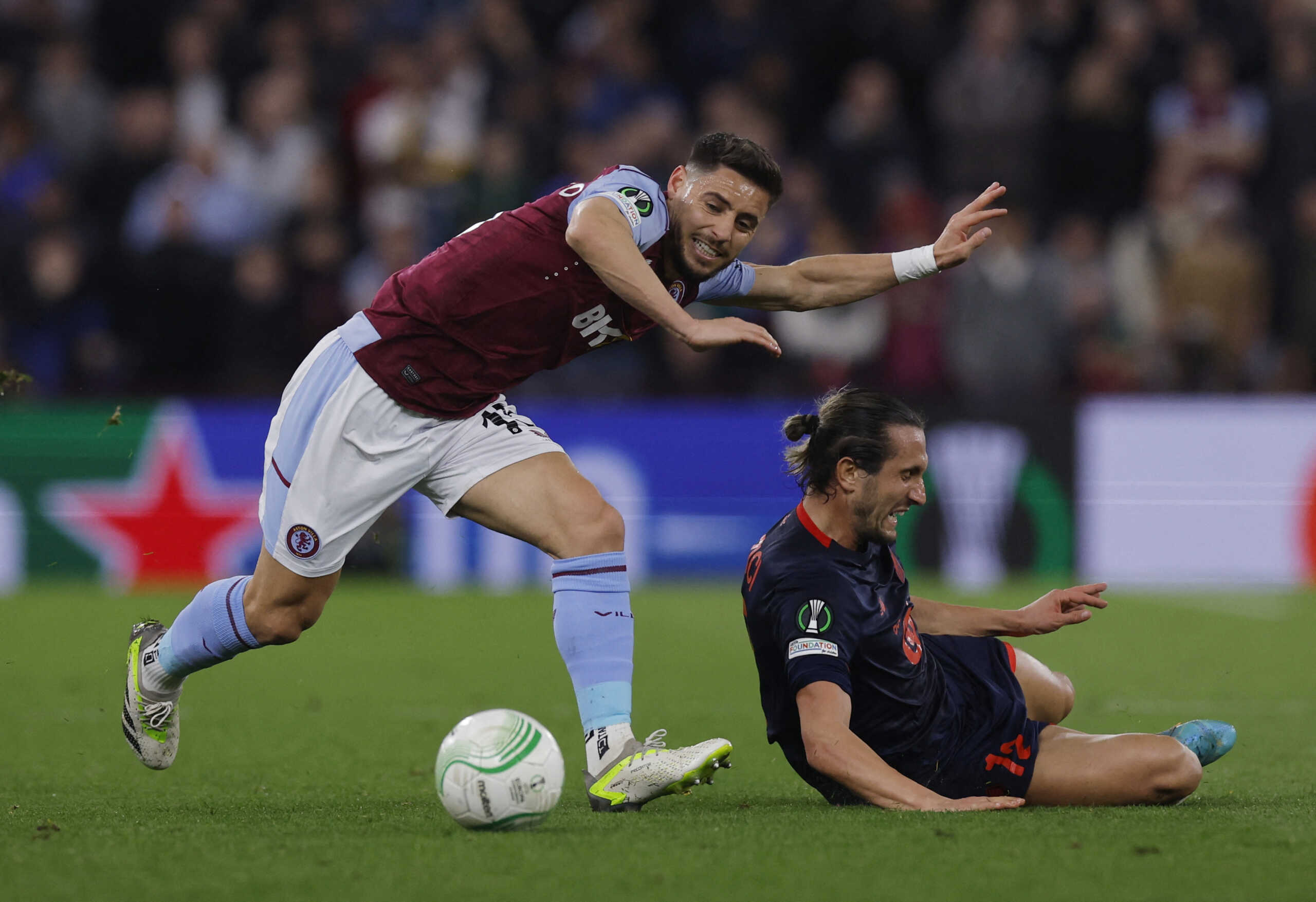 Soccer Football - Europa Conference League - Quarter Final - First Leg - Aston Villa v Lille - Villa Park, Birmingham, Britain - April 11, 2024 Lille's Yusuf Yazici in action with Aston Villa's Alex Moreno Action Images via Reuters