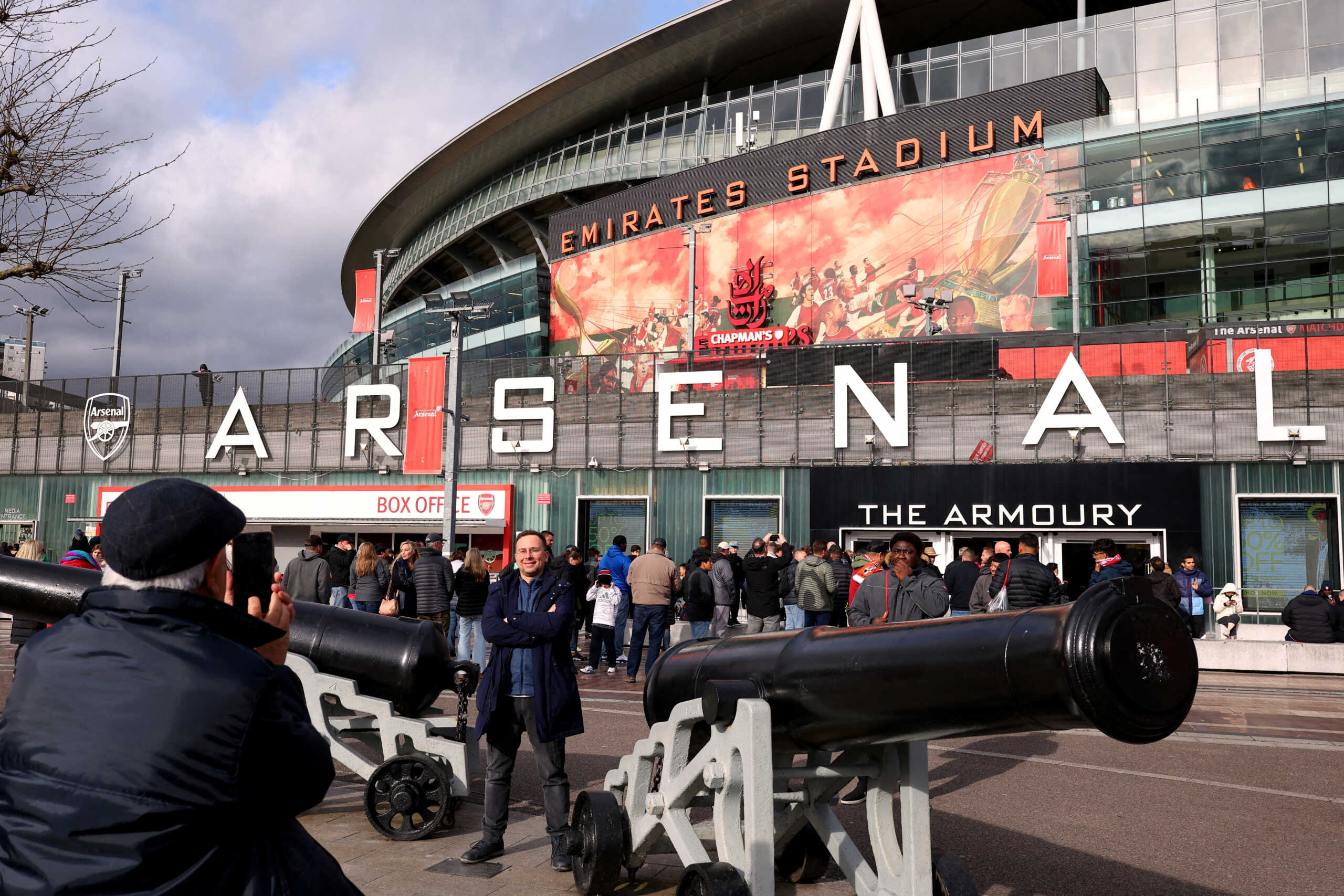 FILE PHOTO: Soccer Football - Premier League - Arsenal v Luton Town - Emirates Stadium, London, Britain - April 3, 2024 Fans outside the stadium before the match REUTERS