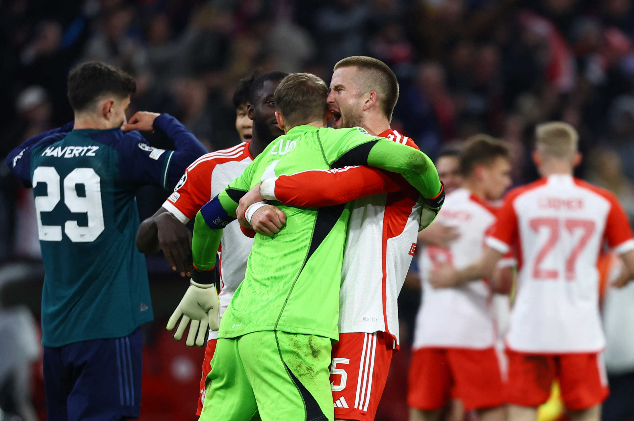 Soccer Football - Champions League - Quarter Final - Second Leg - Bayern Munich v Arsenal - Allianz Arena, Munich, Germany - April 17, 2024 Bayern Munich's Manuel Neuer and Eric Dier celebrate after the match REUTERS