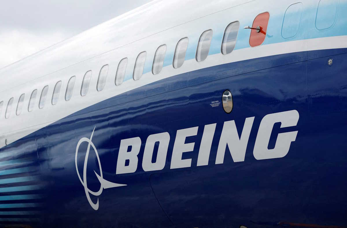 FILE PHOTO: The Boeing logo is seen at the Farnborough International Airshow, in Farnborough, Britain, July 20, 2022.  REUTERS