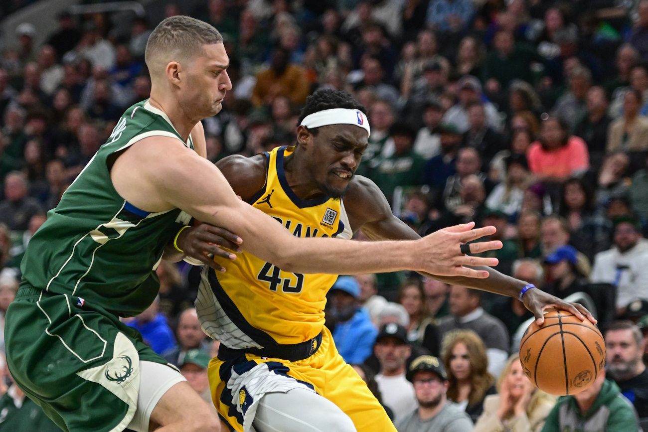 Apr 21, 2024; Milwaukee, Wisconsin, USA; Indiana Pacers forward Pascal Siakam (43) tries to get past Milwaukee Bucks center Brook Lopez (11) in the third quarter during game one of the first round for the 2024 NBA playoffs at Fiserv Forum. Mandatory Credit: Benny Sieu-USA TODAY Sports