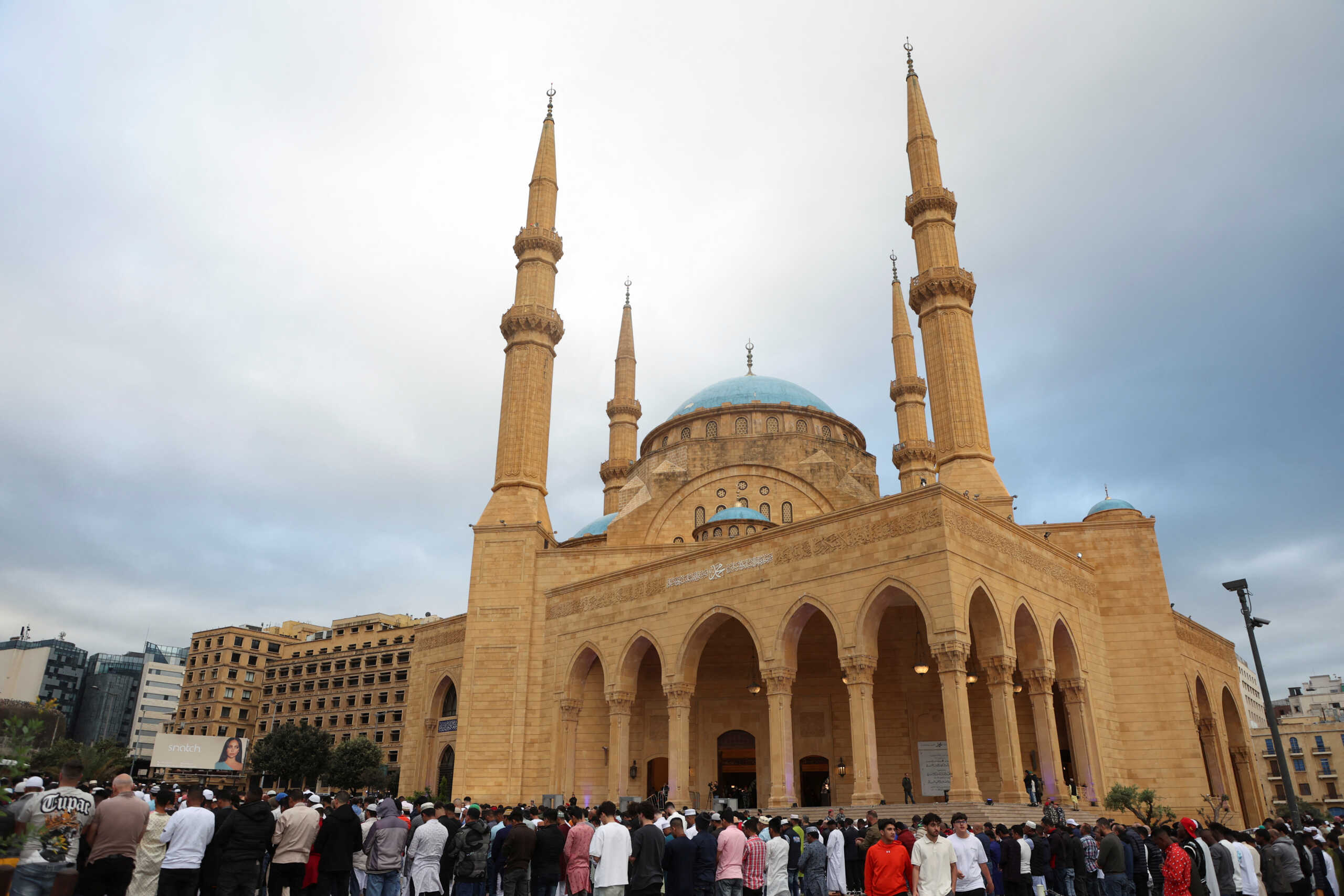 Muslim worshippers attend Eid al-Fitr prayers, marking the end of the holy fasting month of Ramadan, outside Al-Amin mosque in downtown Beirut, Lebanon April 10, 2024. REUTERS