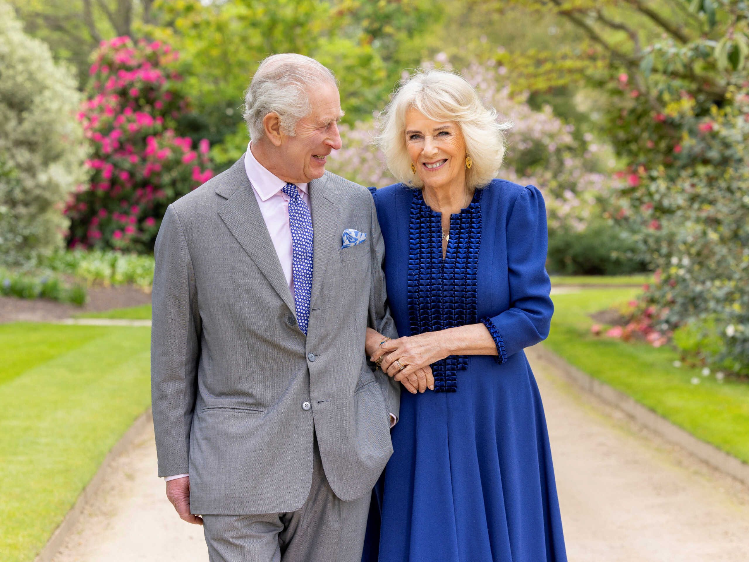 Britain's King Charles and Queen Camilla appear in Buckingham Palace Gardens the day after their 19th wedding anniversary, in London, Britain, April 10, 2024, in this handout picture released by the Buckingham Palace on April 26, 2024. Millie Pilkington