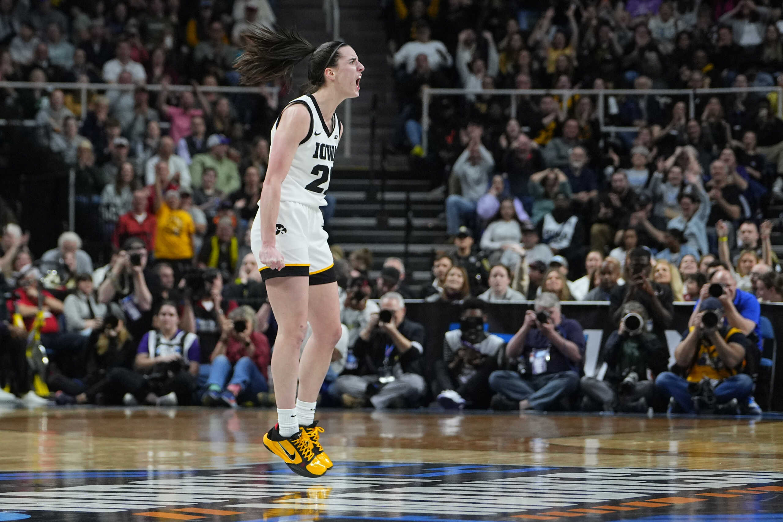 Apr 1, 2024; Albany, NY, USA; Iowa Hawkeyes guard Caitlin Clark (22) reacts in the fourth quarter against the LSU Lady Tigers in the finals of the Albany Regional in the 2024 NCAA Tournament at MVP Arena. Mandatory Credit: Gregory Fisher-USA TODAY Sports