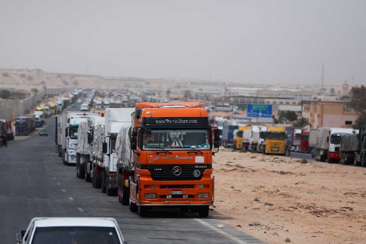 Trucks stand at the Rafah border crossing between Egypt and the Gaza Strip, amid the ongoing conflict between Israel and Palestinian Islamist group Hamas, in Rafah, Egypt, April 25, 2024. REUTERS
