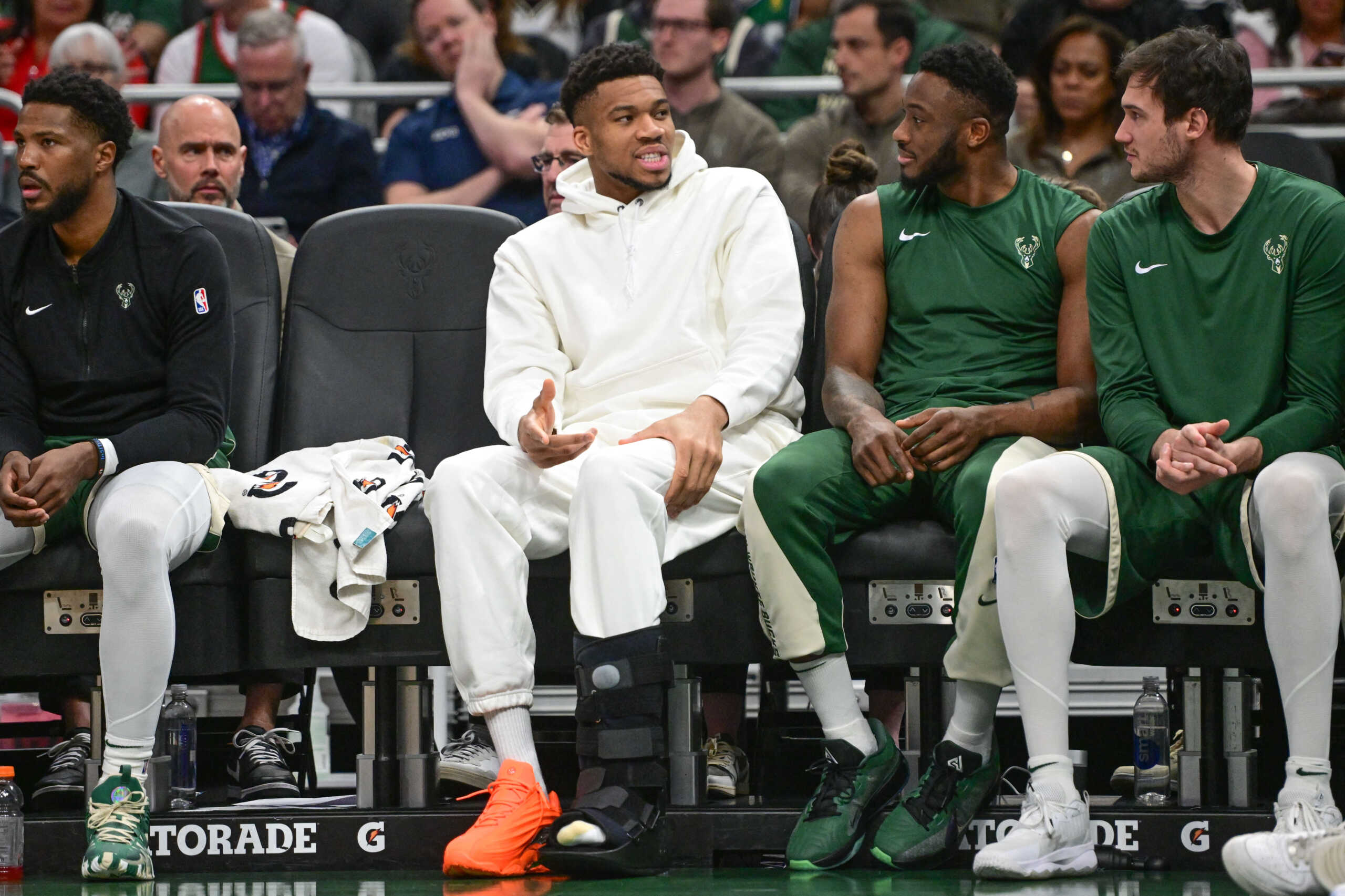 Apr 10, 2024; Milwaukee, Wisconsin, USA;  Milwaukee Bucks forward Giannis Antetokounmpo (34) sits on the bench with a calf injury in the second quarter against the Orlando Magic at Fiserv Forum. Mandatory Credit: Benny Sieu-USA TODAY Sports