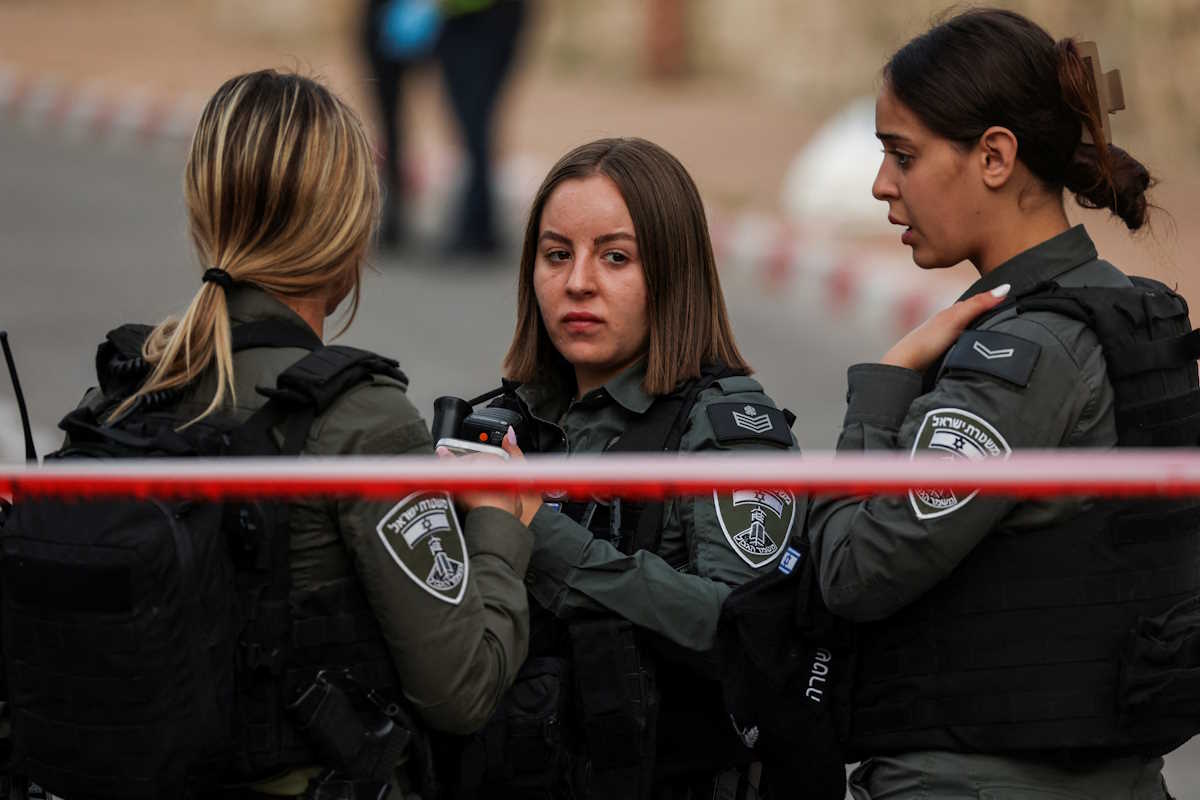Israeli border police officers look on near the area where a suspected stabbing incident took place, in Ramle, Israel April 26, 2024 REUTERS