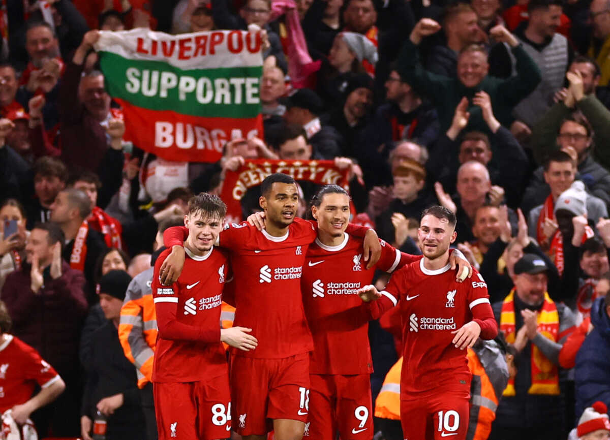 Soccer Football - Premier League - Liverpool v Sheffield United - Anfield, Liverpool, Britain - April 4, 2024 Liverpool's Cody Gakpo celebrates scoring their third goal with teammates REUTERS