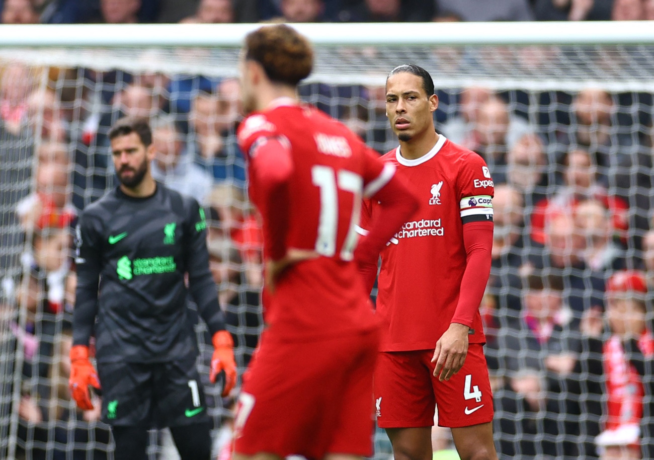 Soccer Football - Premier League - Liverpool v Crystal Palace - Anfield, Liverpool, Britain - April 14, 2024 Liverpool's Virgil van Dijk looks dejected after Crystal Palace's Eberechi Eze scores their first goal REUTERS
