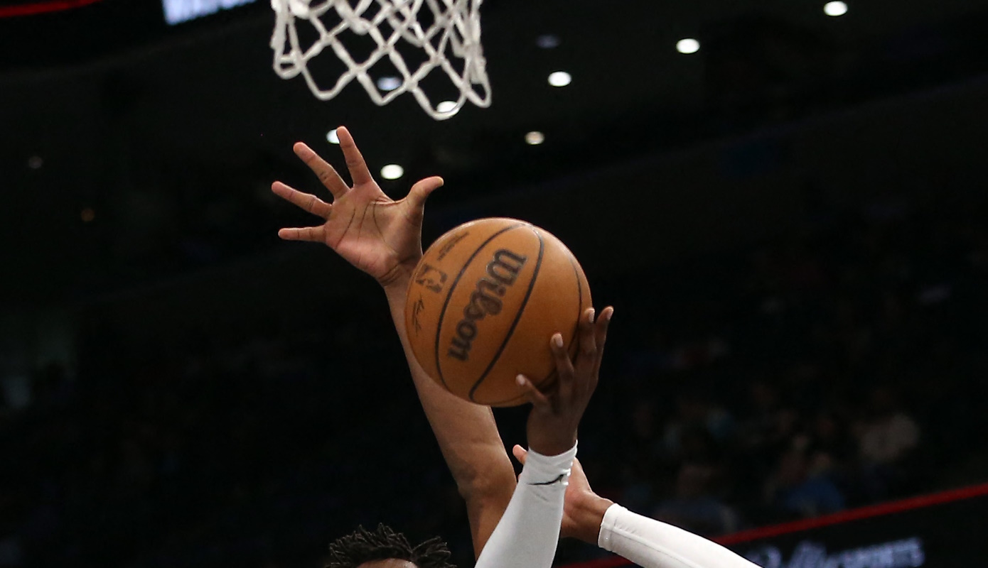 Apr 14, 2024; Memphis, Tennessee, USA; Memphis Grizzlies forward GG Jackson (45) shoots as Denver Nuggets forward Peyton Watson (8) defends during the second half at FedExForum. Mandatory Credit: Petre Thomas-USA TODAY Sports