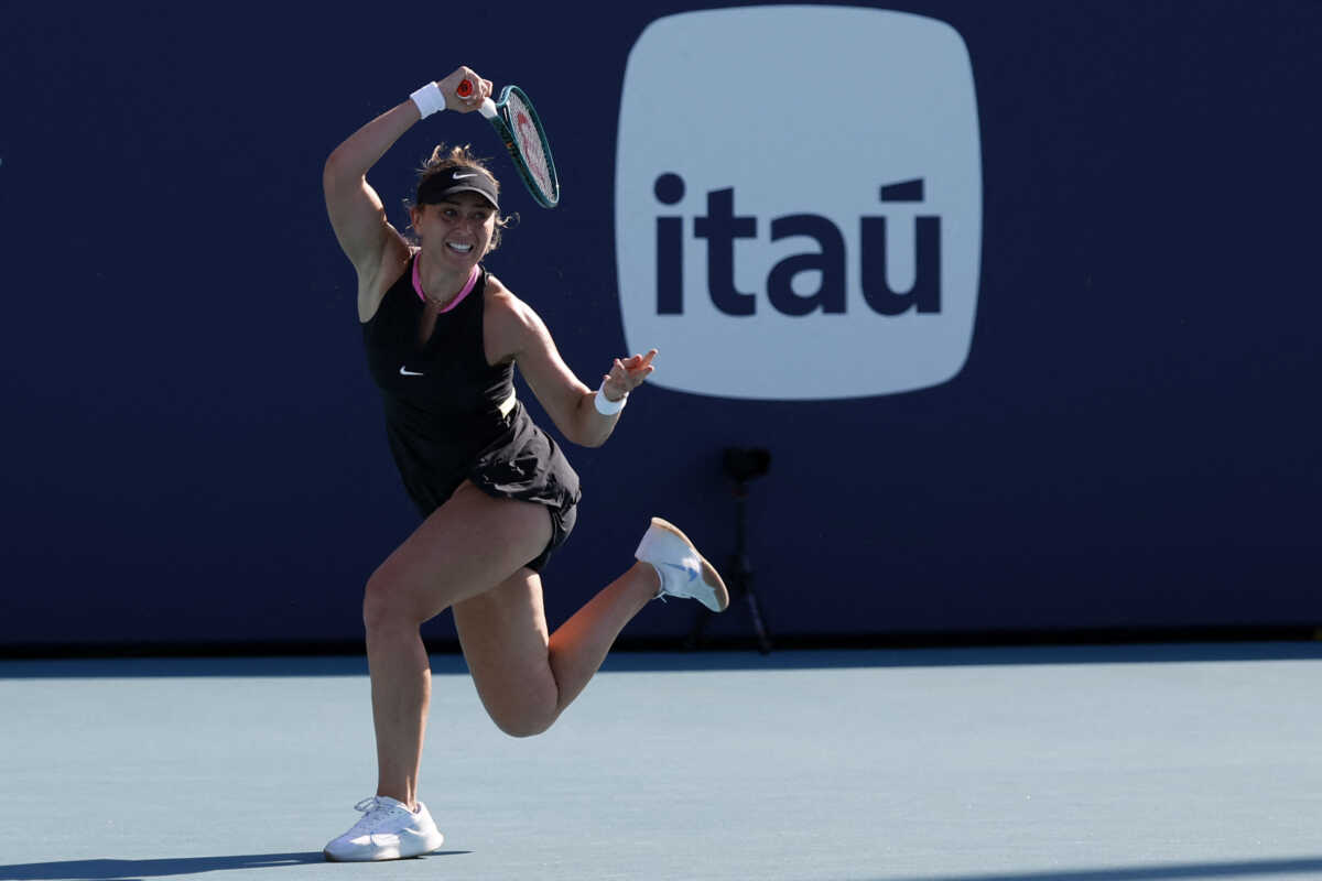 Mar 19, 2024; Miami Gardens, FL, USA; Paula Badosa (ESP) hits a forehand against Simona Halep (ROU) (not pictured) on day two of the Miami Open at Hard Rock Stadium. Mandatory Credit: Geoff Burke-USA TODAY Sports