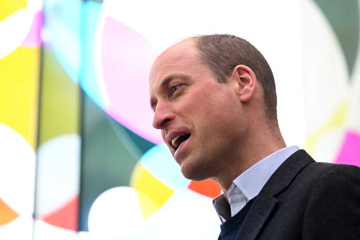 FILE PHOTO: Britain's William, Prince of Wales, speaks with a delegate after attending the Homewards Sheffield Local Coalition meeting at the Millennium Gallery in Sheffield, Britain, March 19, 2024. OLI SCARFF