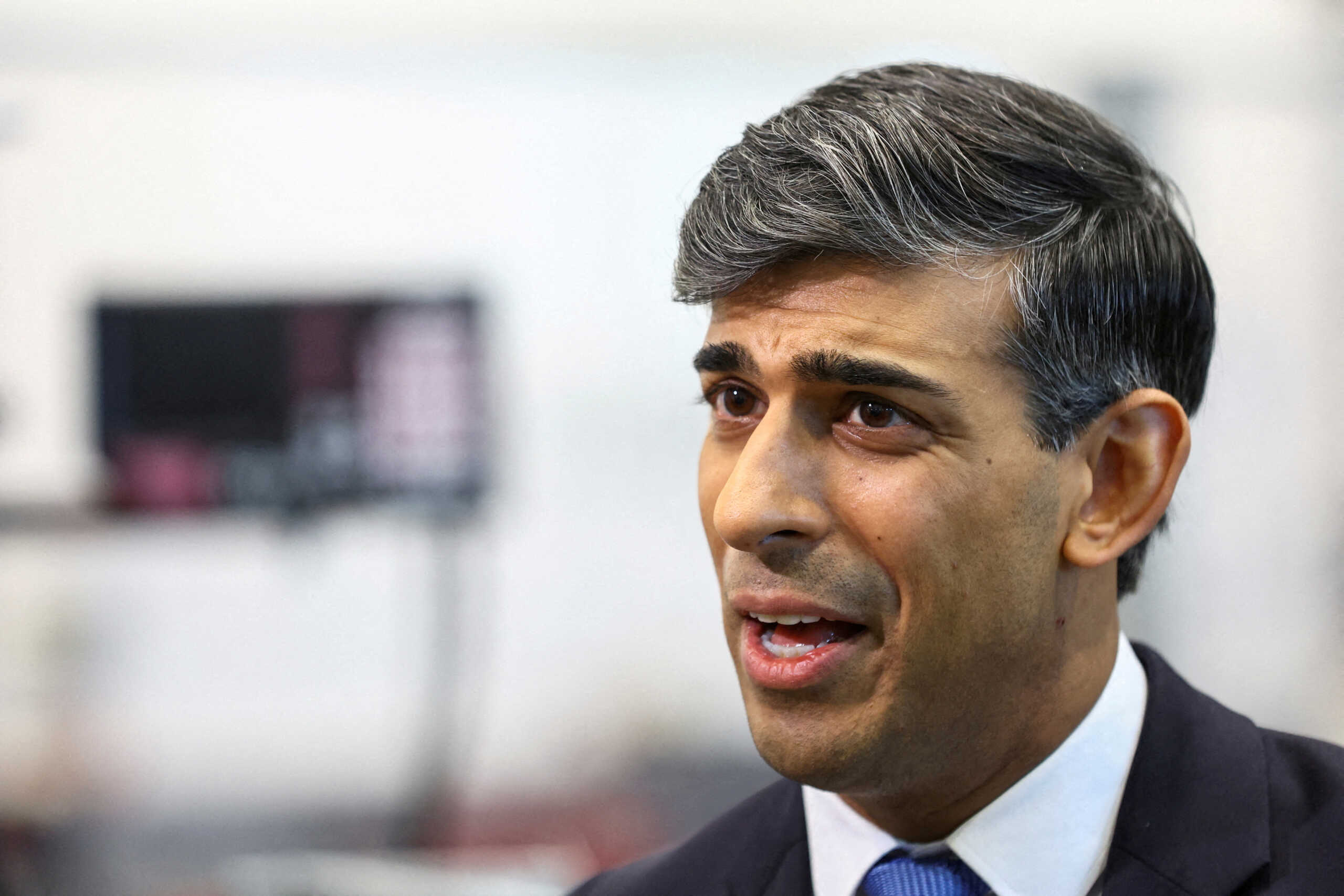 FILE PHOTO: British Prime Minister Rishi Sunak speaks as he visits an apprentice training centre at the Manufacturing Technology Centre (MTC), in Coventry, Britain, March 18, 2024. REUTERS