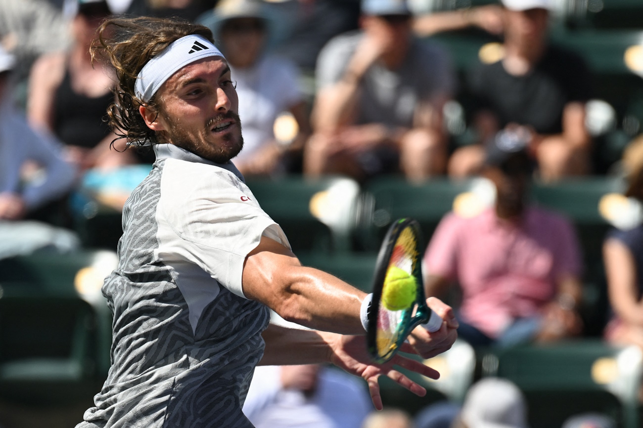 Mar 10, 2024; Indian Wells, CA, USA; Stefanos Tsitsipas (GRE) hits a shot in his third round match against Frances Tiafoe (USA) during the BNP Paribas Open at Indian Wells Tennis Garden. Mandatory Credit: Jonathan Hui-USA TODAY Sports