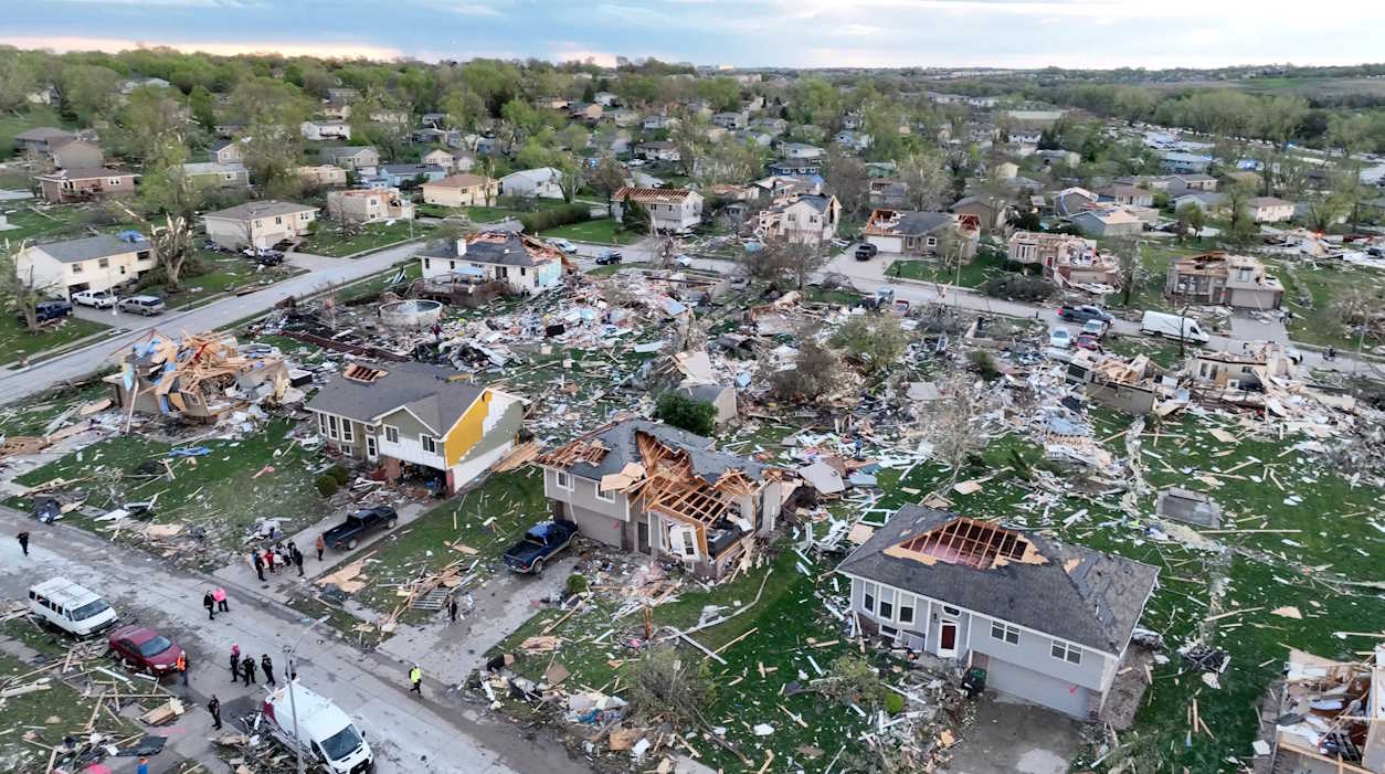 A drone view shows emergency personnel working at the site of damaged buildings in the aftermath of a tornado in Omaha, Nebraska, U.S. April 26, 2024, in this still image obtained from a social media video. Alex freed