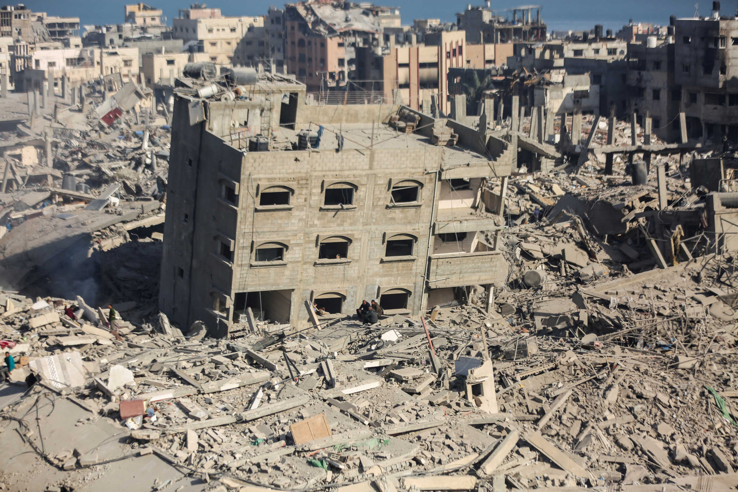 Palestinians inspect destroyed houses and buildings at the area around Al Shifa Hospital following a two-week Israeli operation, amid the ongoing conflict between Israel and Hamas, in Gaza City April 1, 2024. REUTERS