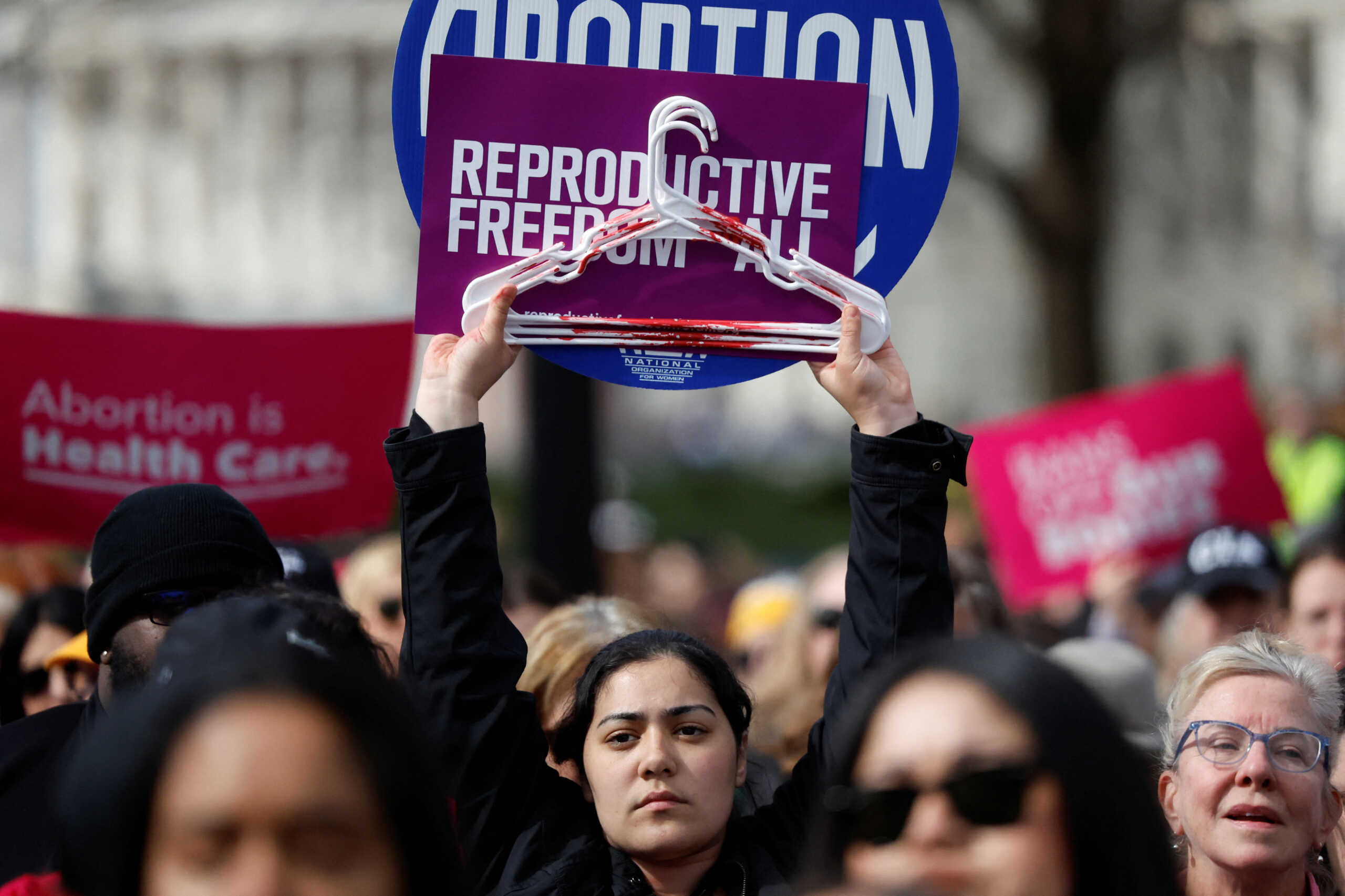 Demonstrators for abortion rights take part in a protest outside the U.S. Supreme Court as justices hear oral arguments in a bid by President Joe Biden's administration to preserve broad access to the abortion pill, in Washington, U.S., March 26, 2024. REUTERS