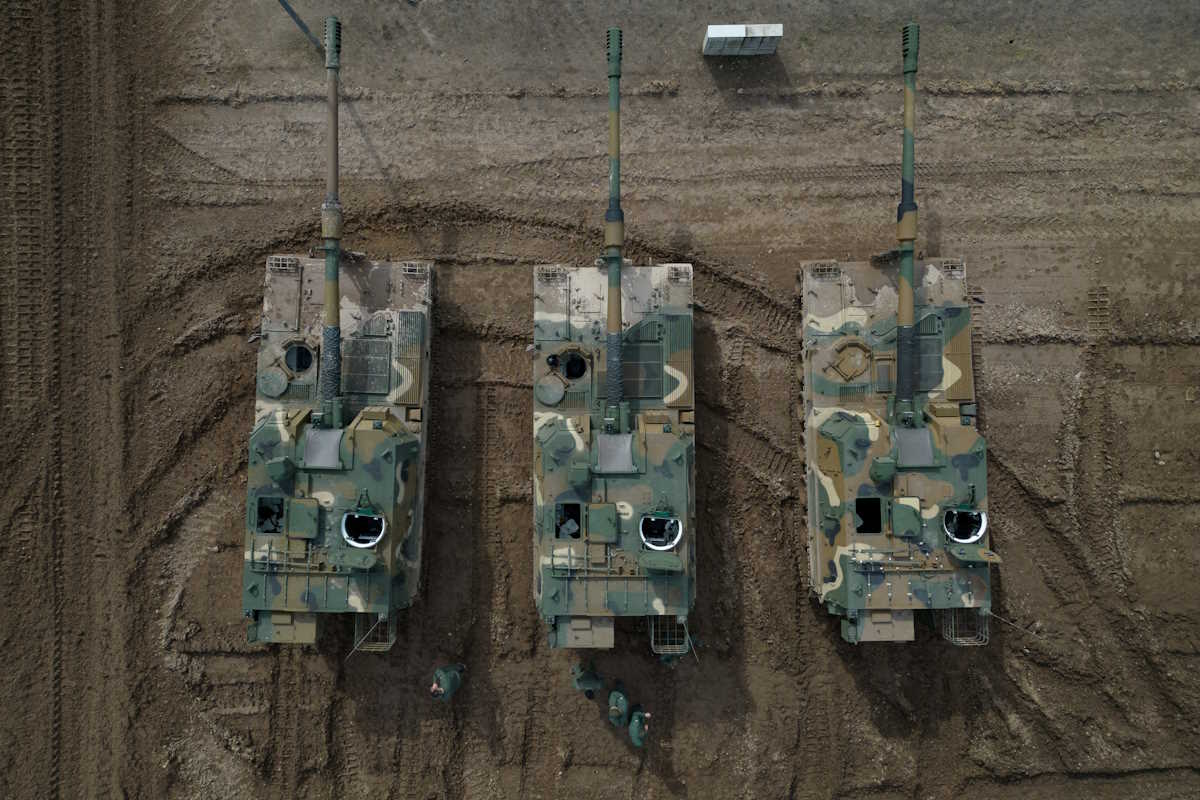 FILE PHOTO: Polish soldiers stand near K9 howitzers, delivered in the first batch of arms from South Korea under contracts signed in recent months, during a military drill at a military range in Wierzbiny near Orzysz, Poland, March 30, 2023. REUTERS