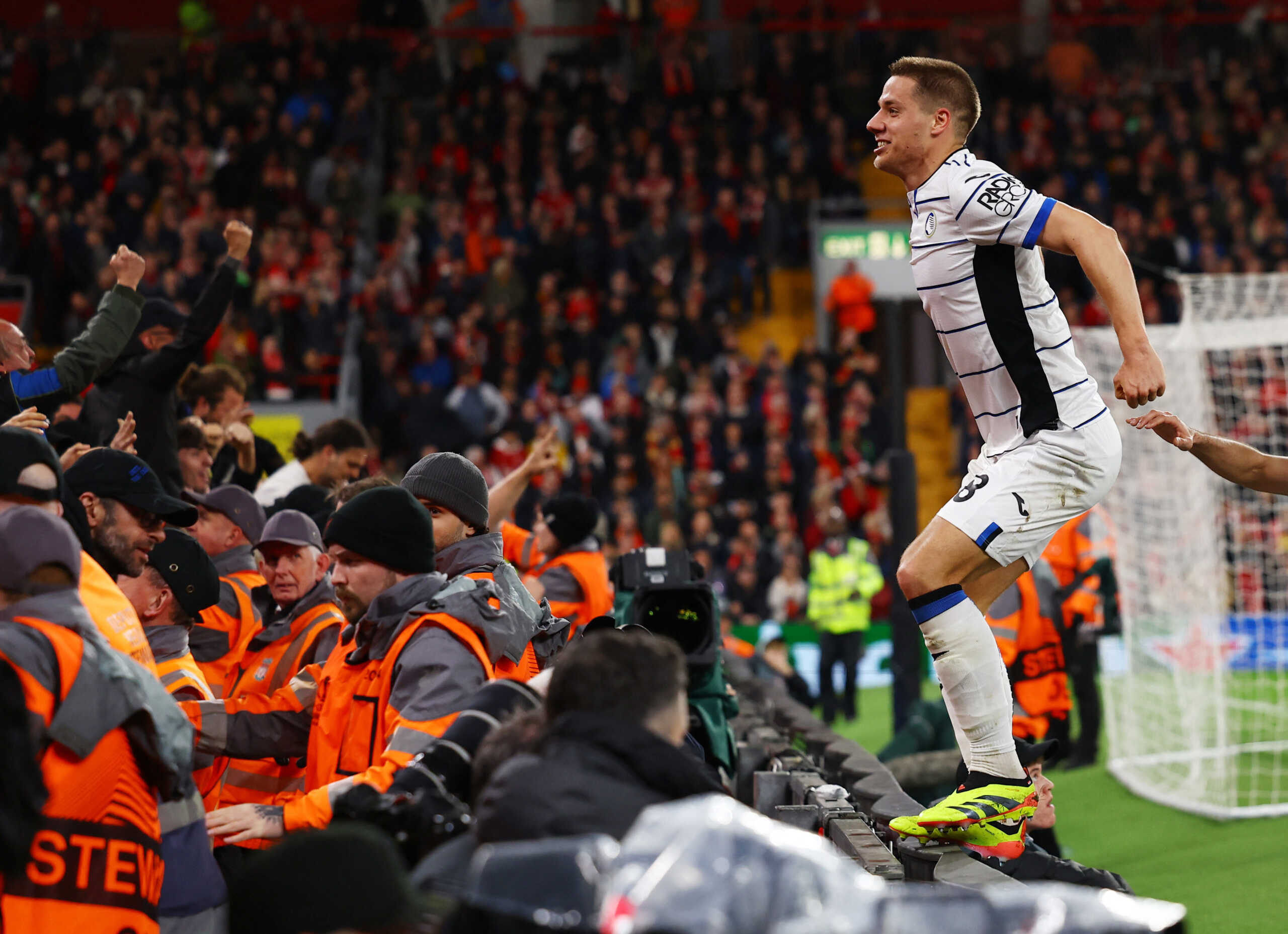 Soccer Football - Europa League - Quarter Final - First Leg - Liverpool v Atalanta - Anfield, Liverpool, Britain - April 11, 2024 Atalanta's Mario Pasalic celebrates scoring their third goal Action Images via Reuters