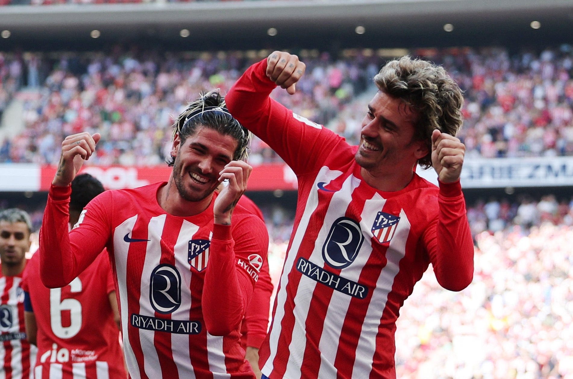 Soccer Football - LaLiga - Atletico Madrid v Girona - Metropolitano, Madrid, Spain - April 13, 2024 Atletico Madrid's Antoine Griezmann celebrates scoring their first goal with Rodrigo De Paul REUTERS