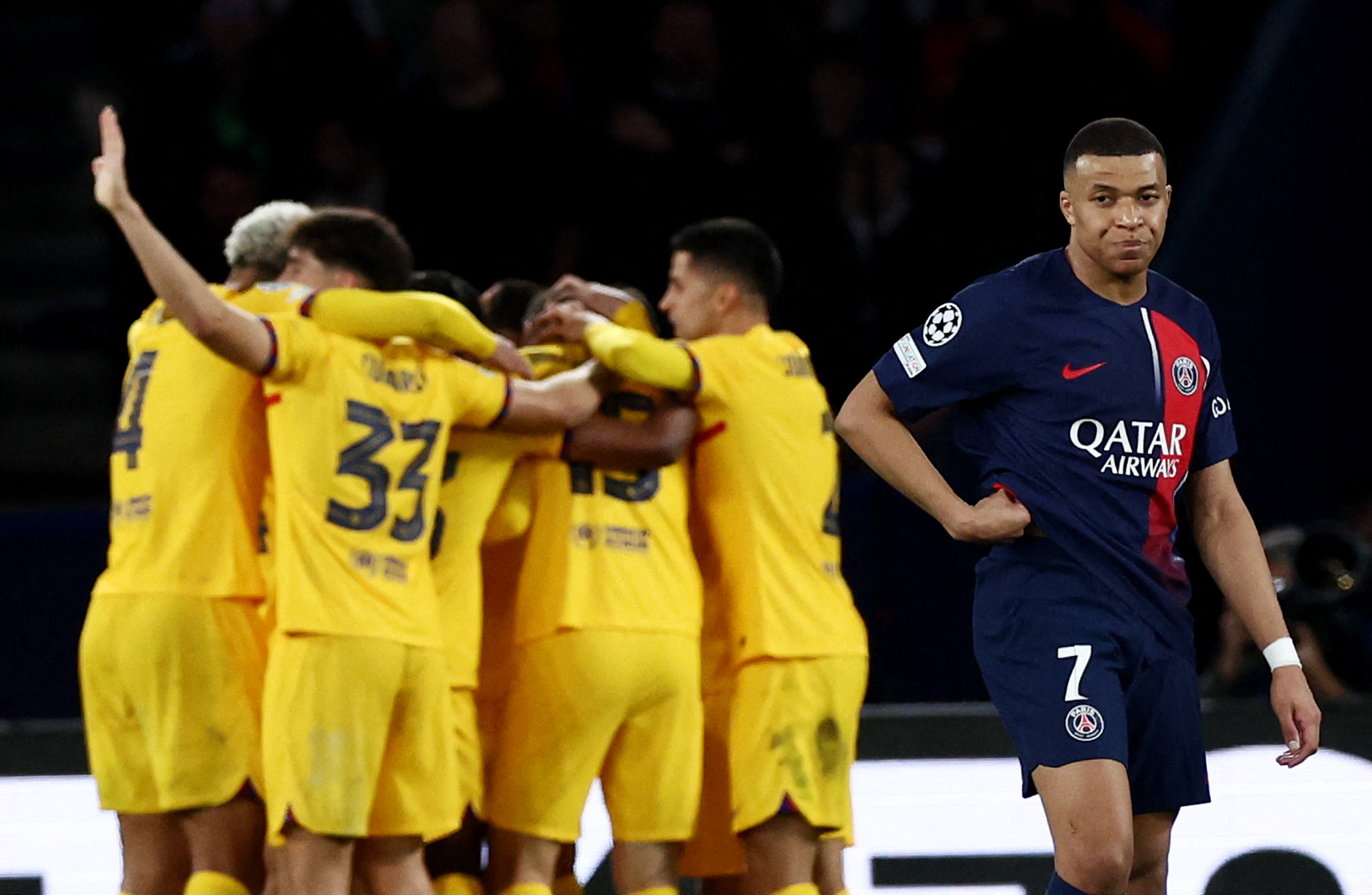 Soccer Football - Champions League - Quarter Final - First Leg - Paris St Germain v FC Barcelona - Parc des Princes, Paris, France - April 10, 2024 Paris St Germain's Kylian Mbappe looks dejected after FC Barcelona's Andreas Christensen scores their third goal REUTERS
