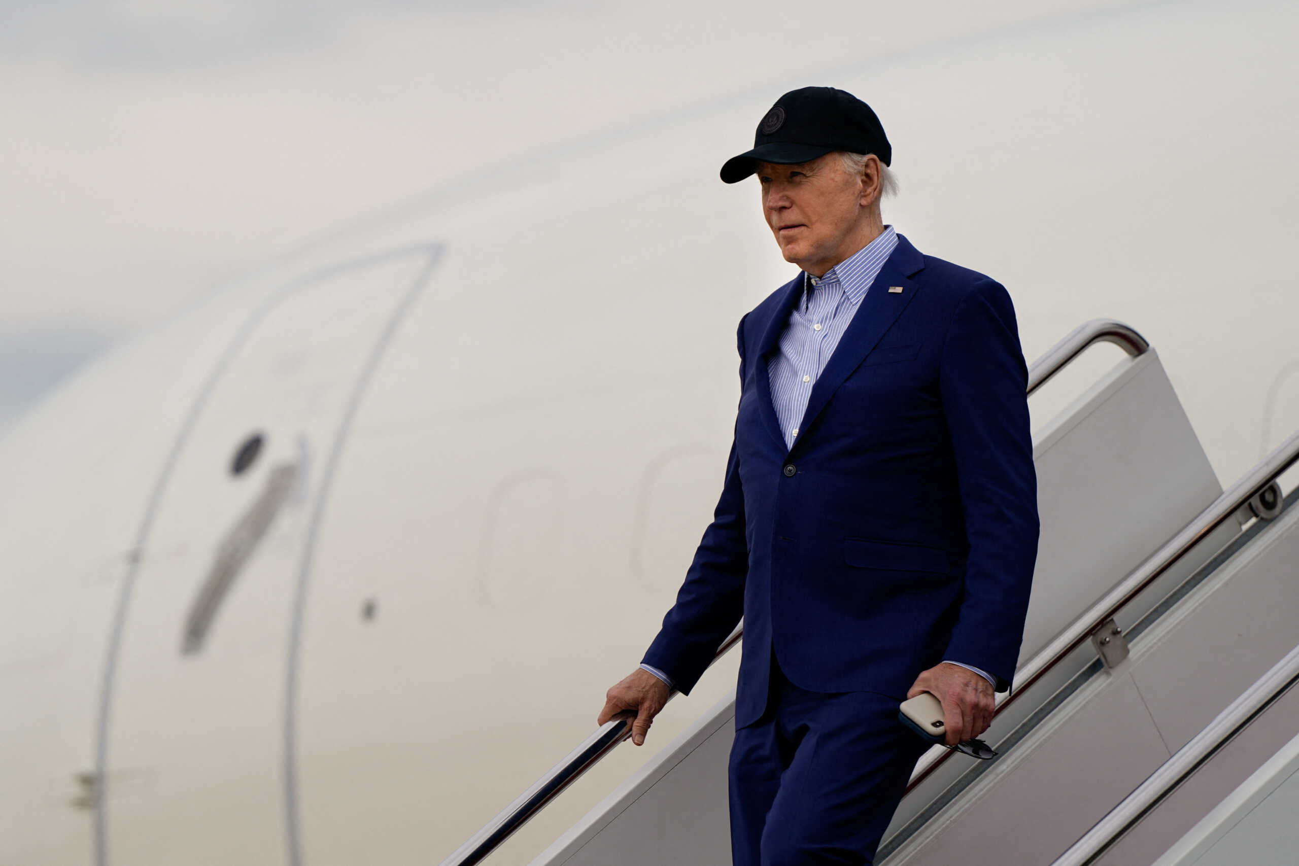 U.S. President Joe Biden disembarks from Air Force One en route to Washington, at Joint Base Andrews, Maryland, U.S., April 17, 2024. REUTERS