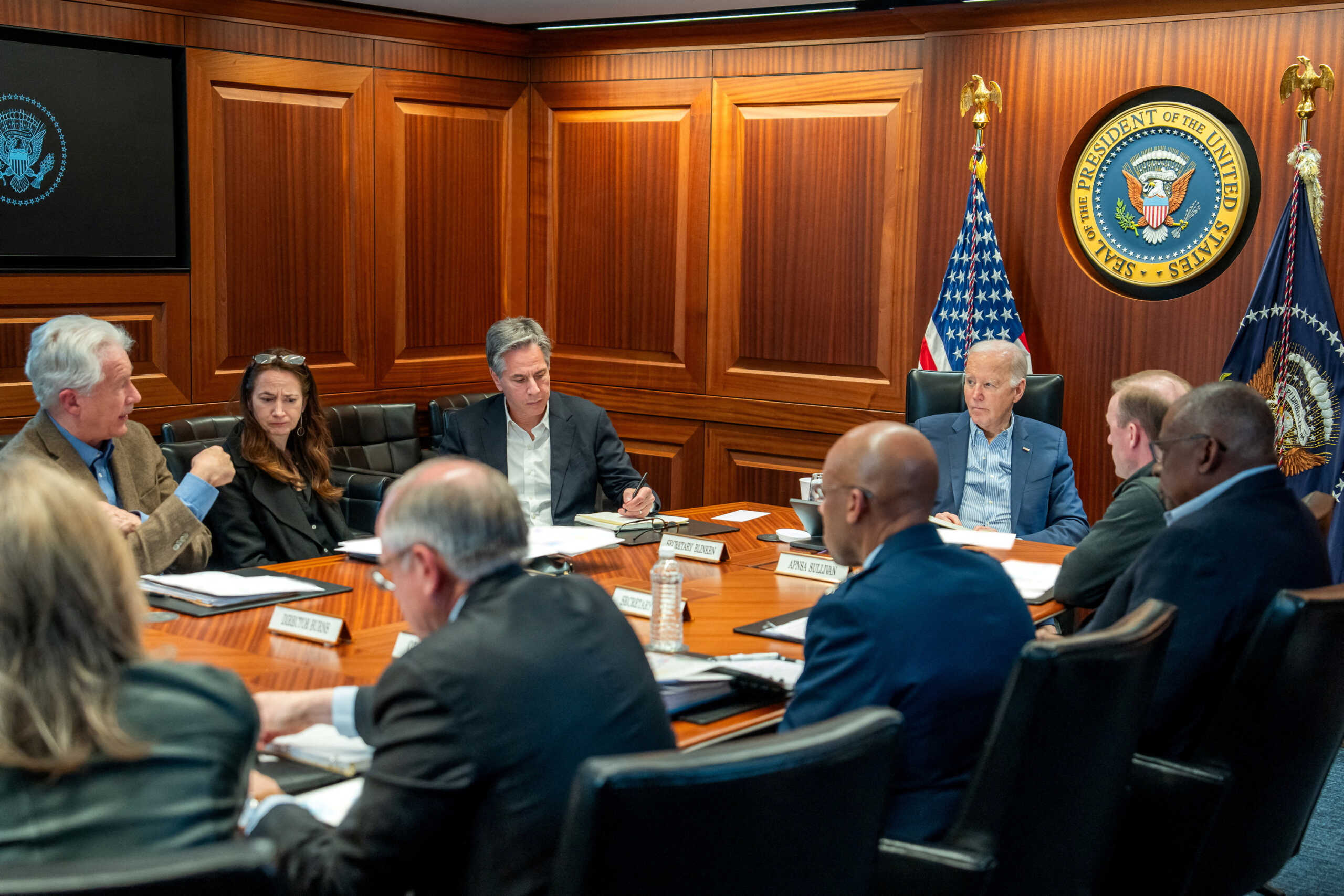U.S. President Joe Biden meets with members of his national security team as seen in this White House handout image taken in the Situation Room at the White House, in Washington, U.S., April 13, 2024. The White House