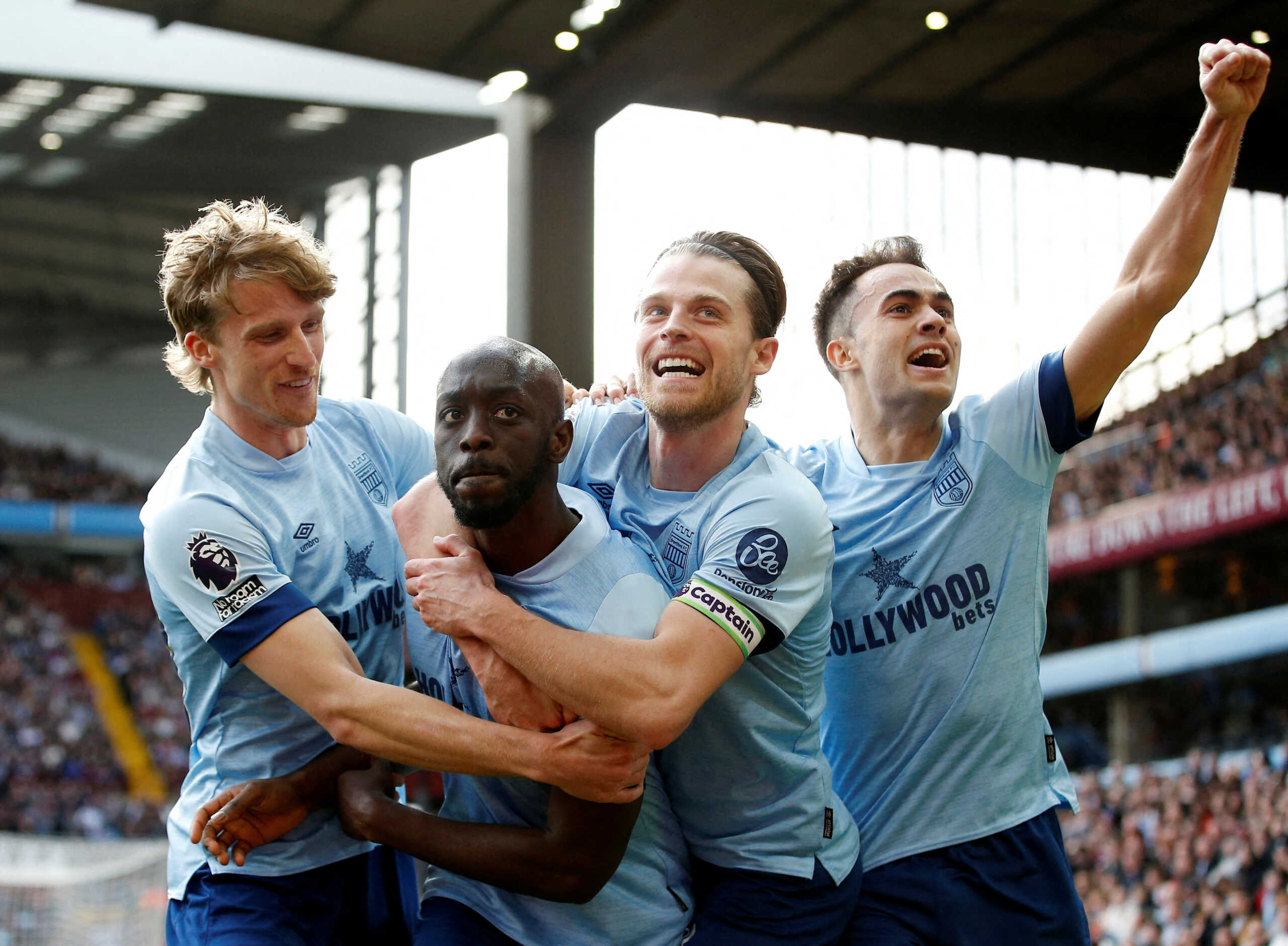 Soccer Football - Premier League - Aston Villa v Brentford - Villa Park, Birmingham, Britain - April 6, 2024 Brentford's Yoane Wissa celebrates scoring their third goal with Mathias Jensen, Mads Roerslev and Sergio Reguilon Action Images via Reuters