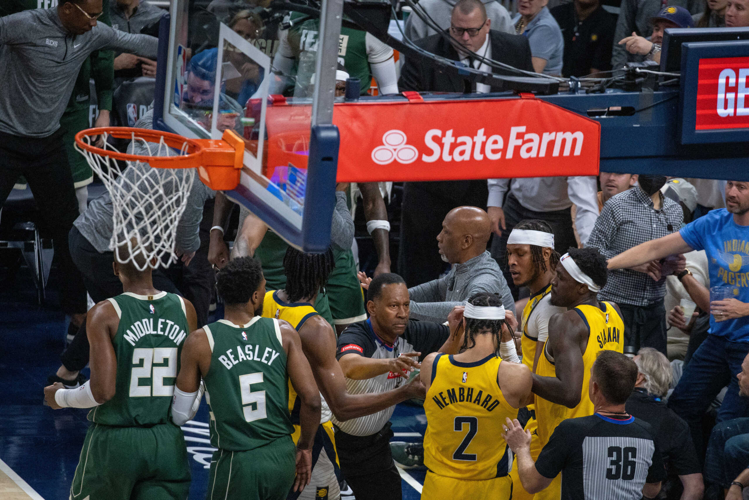 Apr 28, 2024; Indianapolis, Indiana, USA; Indiana Pacers guard Andrew Nembhard (2) and Milwaukee Bucks forward Bobby Portis (9) get into a fight during game four of the first round for the 2024 NBA playoffs at Gainbridge Fieldhouse. Mandatory Credit: Trevor Ruszkowski-USA TODAY Sports