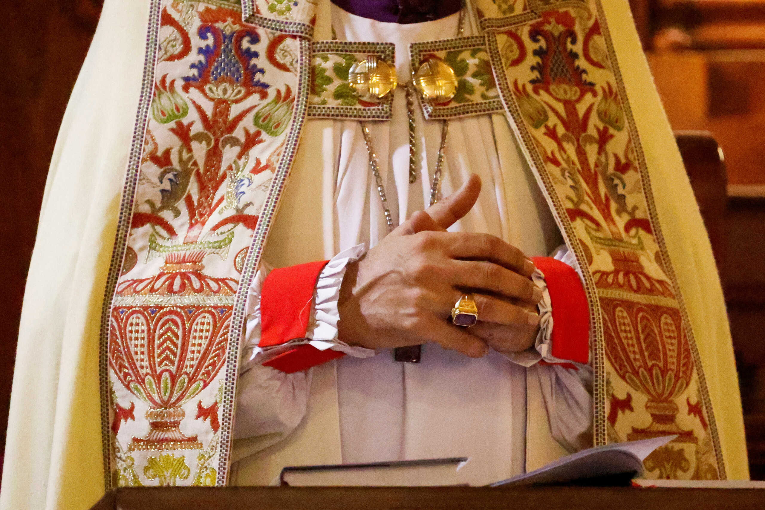 The hands of the Diocese of Sindh and Balochistan Church of Pakistan, Bishop Frederick John, are pictured as he leads the Easter Sunday service, at the Holy Trinity Cathedral Church of Pakistan, in Karachi, Pakistan March 31, 2024. REUTERS