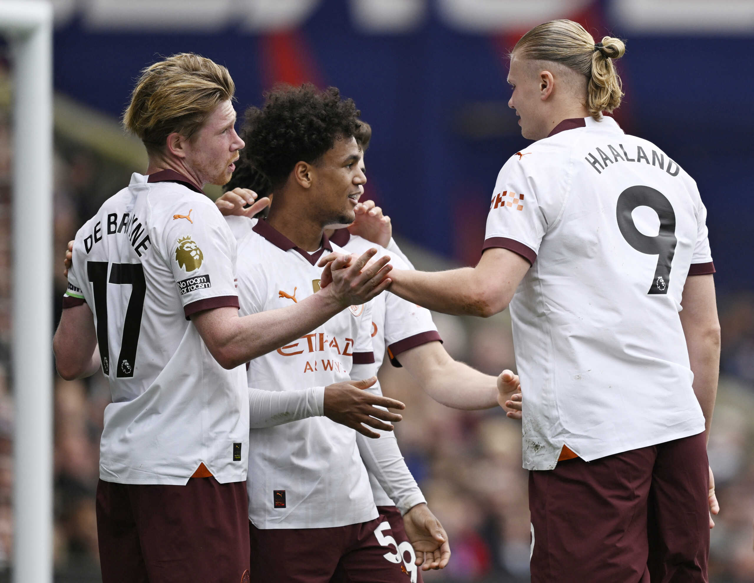 Soccer Football - Premier League - Crystal Palace v Manchester City - Selhurst Park, London, Britain - April 6, 2024 Manchester City's Erling Braut Haaland celebrates scoring their third goal with Oscar Bobb and Kevin De Bruyne REUTERS