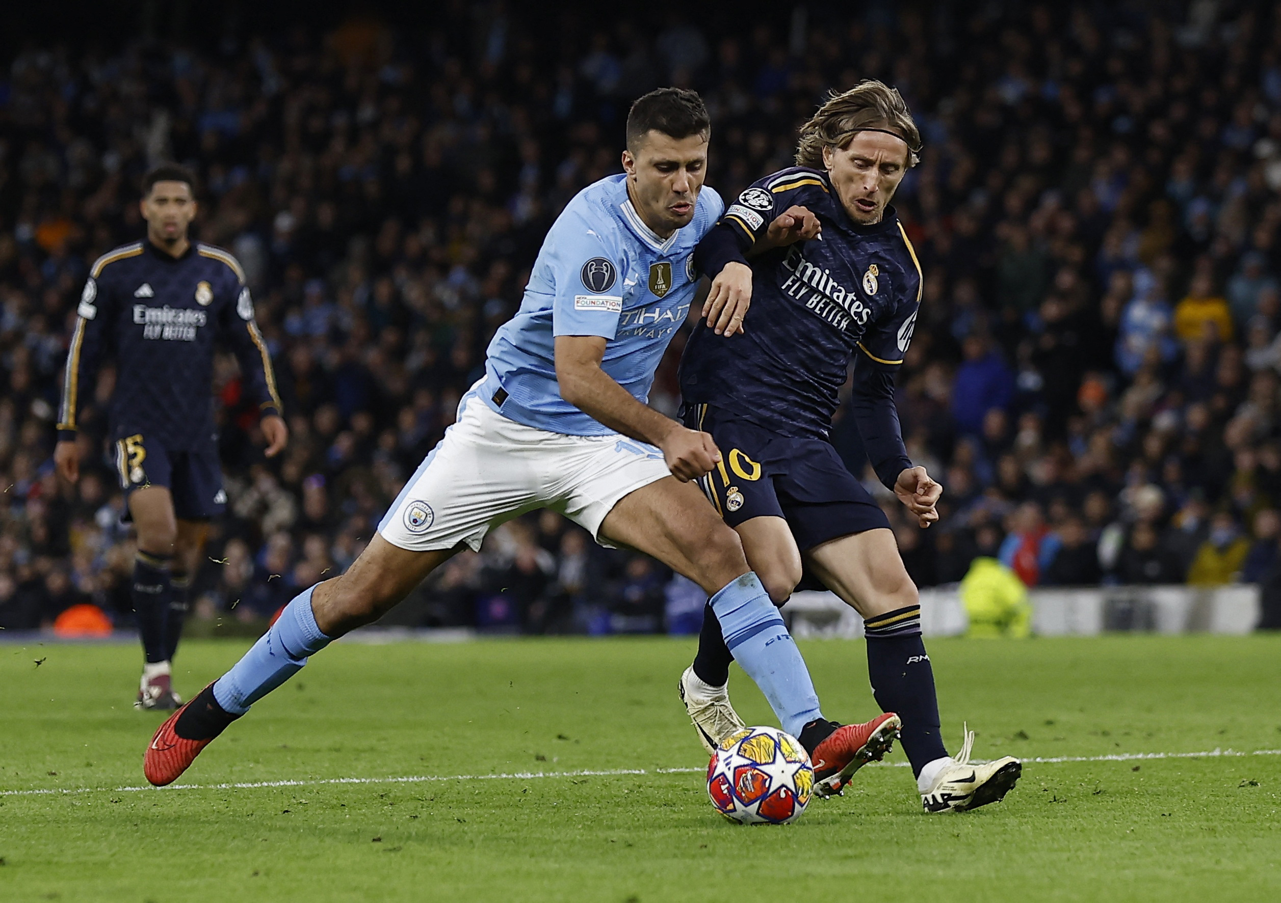 Soccer Football - Champions League - Quarter Final - Second Leg - Manchester City v Real Madrid - Etihad Stadium, Manchester, Britain - April 17, 2024 Manchester City's Rodri in action with Real Madrid's Luka Modric Action Images via Reuters