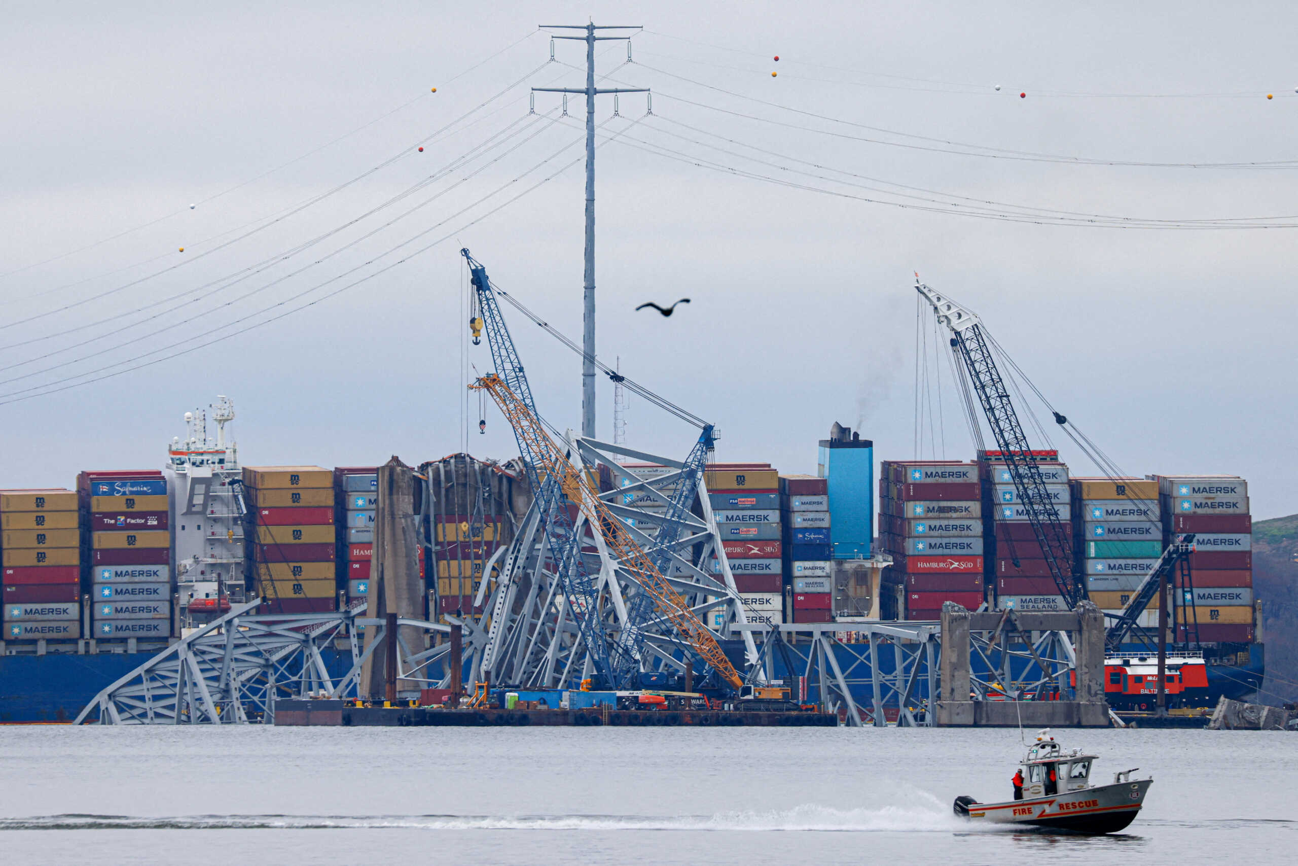 Wreckage of the Francis Scott Key bridge lies across the deck of the Dali cargo vessel as salvage work continues, in Baltimore, Maryland, U.S., April 1, 2024. REUTERS
