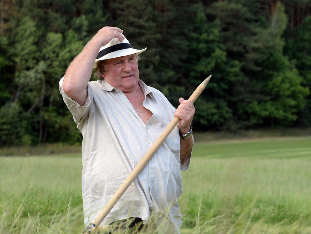 epa09032153 (FILE) - French actor Gerard Depardieu participates in hand-scything on the territory of the Ozerny official presidential residence outside Minsk, Belarus, 22 July 2015  (reissued 23 February 2021). French media citing judicial sources report on 23 February 2021 that Depardieu has been charged with rape. The French actor had already been accused of rape and sexual assault in 2018.  EPA