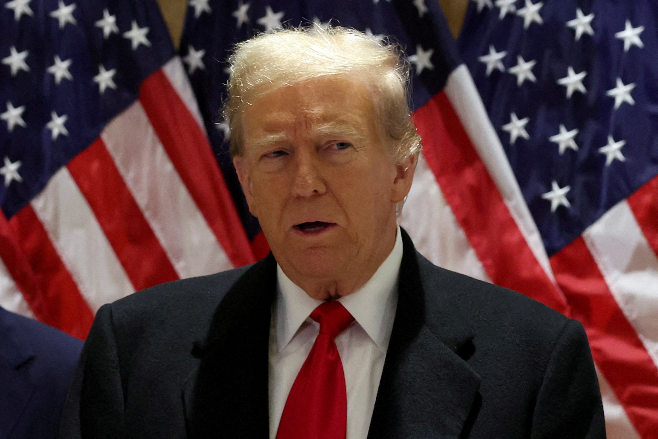 FILE PHOTO: Republican presidential candidate and former U.S. President Donald Trump speaks during a press conference at one of his properties after attending a hearing in his criminal court case on charges stemming from hush money paid to a porn star in New York City, U.S., March 25, 2024. REUTERS