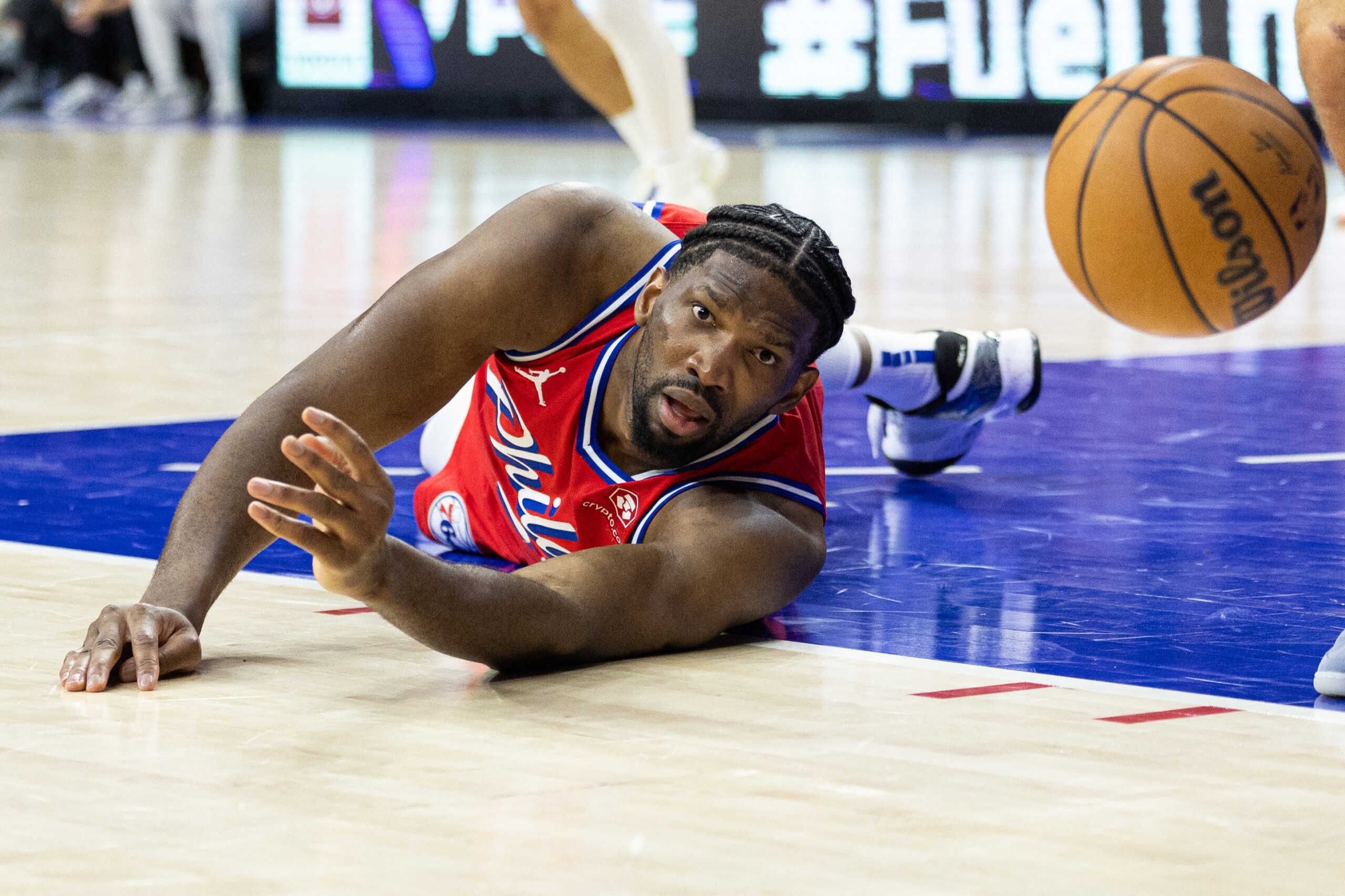 Apr 12, 2024; Philadelphia, Pennsylvania, USA; Philadelphia 76ers center Joel Embiid (21) watches a loose ball bounce away during the fourth quarter Orlando Magic at Wells Fargo Center. Mandatory Credit: Bill Streicher-USA TODAY Sports