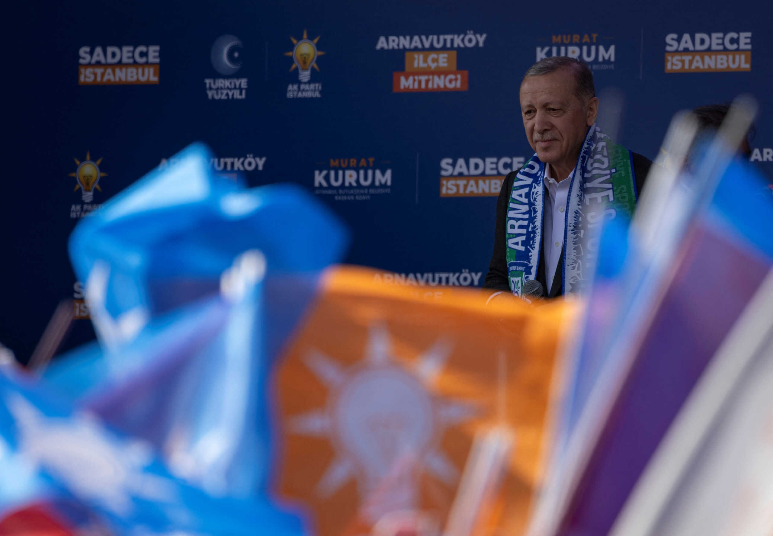 Turkish President Tayyip Erdogan reacts as he addresses his supporters during a rally ahead of the local elections in Istanbul, Turkey, March 30, 2024. REUTERS