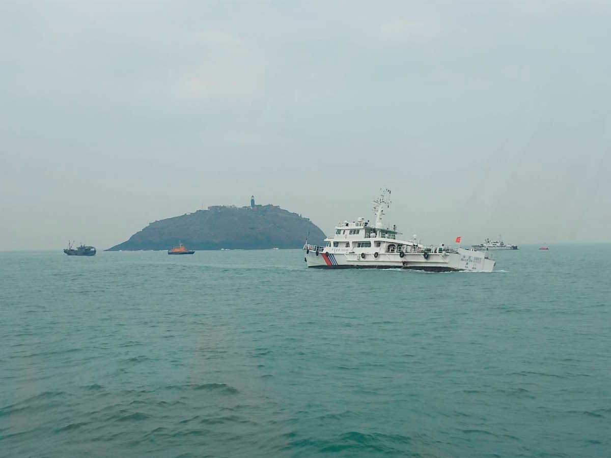Taiwan's coast guard works during a rescue operation after a Chinese fishing boat capsized near Taiwan-controlled Kinmen islands, off the coast of Dongding Island, Kinmen County, Taiwan, in this handout image released on March 14, 2024. Taiwan Coast Guard