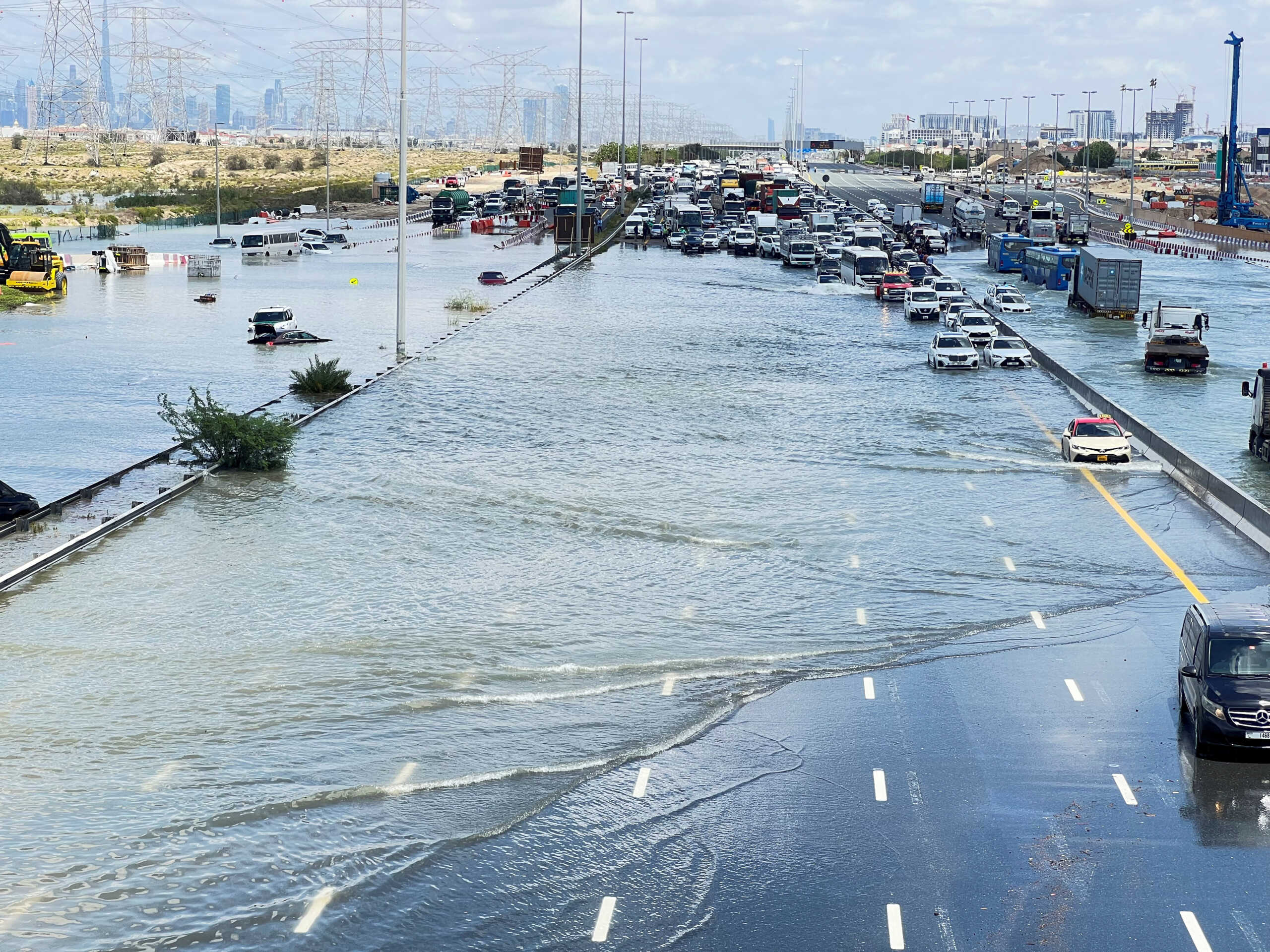 Cars are stuck on a flooded road after a rainstorm hit Dubai, in Dubai, United Arab Emirates, April 17, 2024. REUTERS