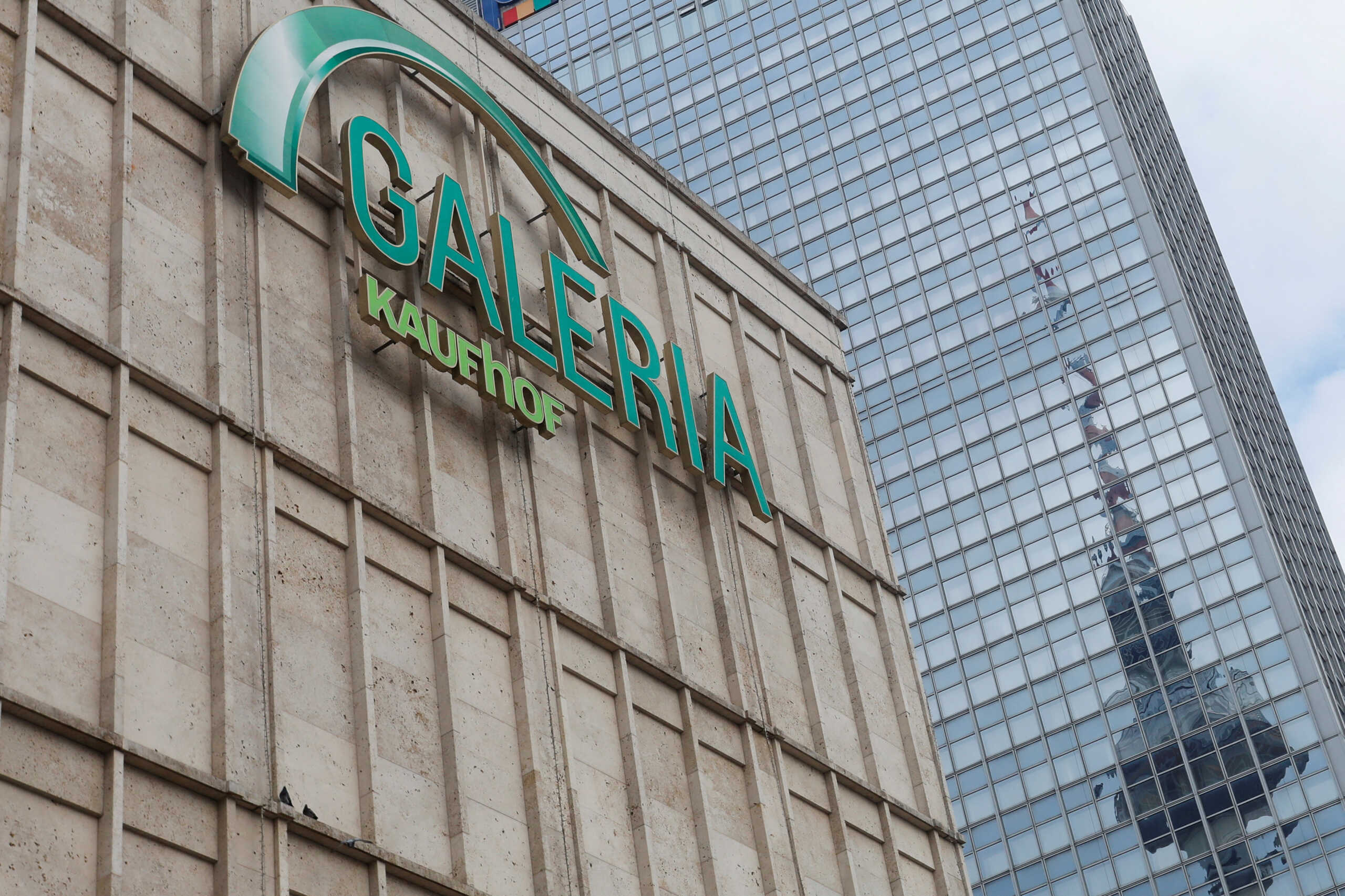 FILE PHOTO: The logo of German retail company Galeria Karstadt Kaufhof hangs at their shopping Mall at Alexanderplatz in Berlin, Germany November 1, 2022.  REUTERS