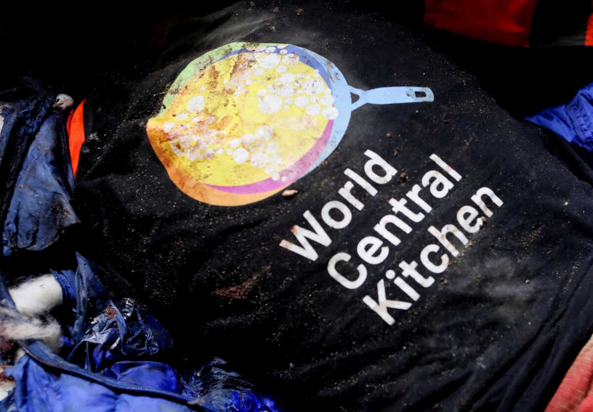 SENSITIVE MATERIAL. THIS IMAGE MAY OFFEND OR DISTURB    The body of an employee from the World Central Kitchen (WCK) non-governmental organization, who was killed along with foreign aid workers in an Israeli airstrike according to the Hamas-run Gaza government media office but the Israeli military said it was conducting a thorough review at the highest levels to understand the circumstances of this "tragic" incident, lies on the ground, at Al-Aqsa hospital in Deir Al-Balah, in the central Gaza Strip April 1, 2024. REUTERS