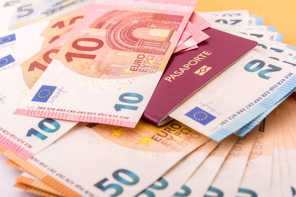 Envelope with euros and european passport.
