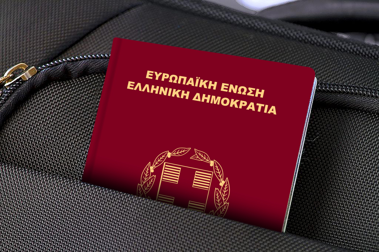 Photo of a single suitcase made of fabric material and one passport in pocket.