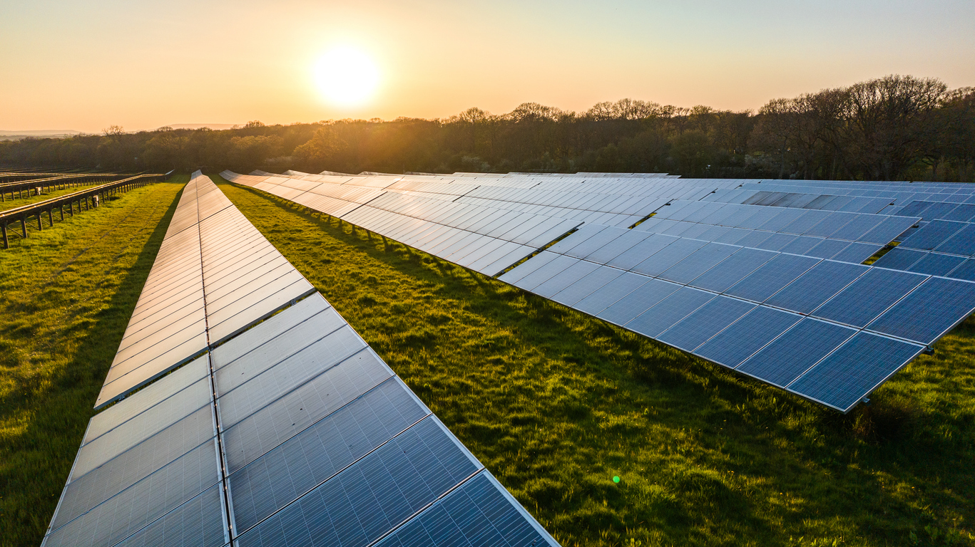 Solar power farm in the evening, West Sussex, UK.