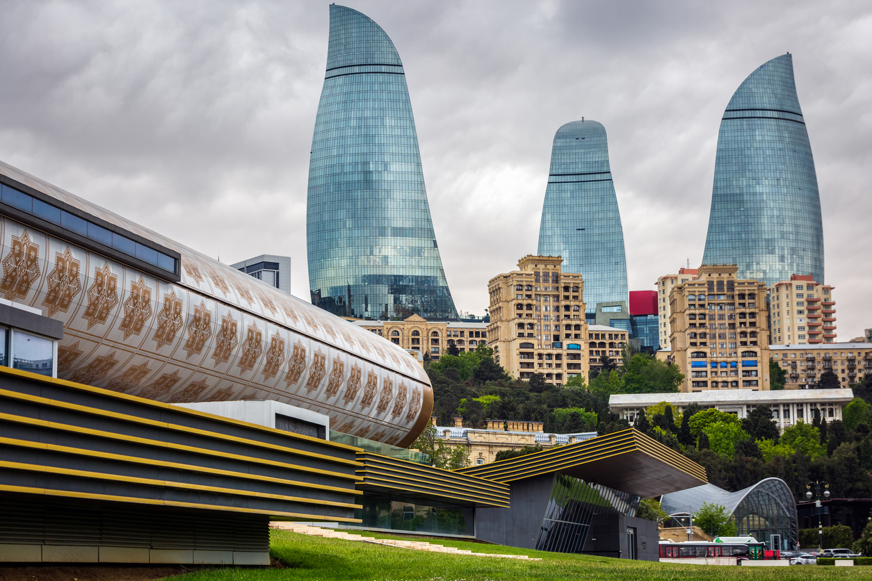 Carpet Museum, designed as partly unfurled rug, on the seaside boulevard in Baku. Designed by Austrian architect Franz Janz. Building was completed in 2014. Baku, Azerbaijan - May 11 2022