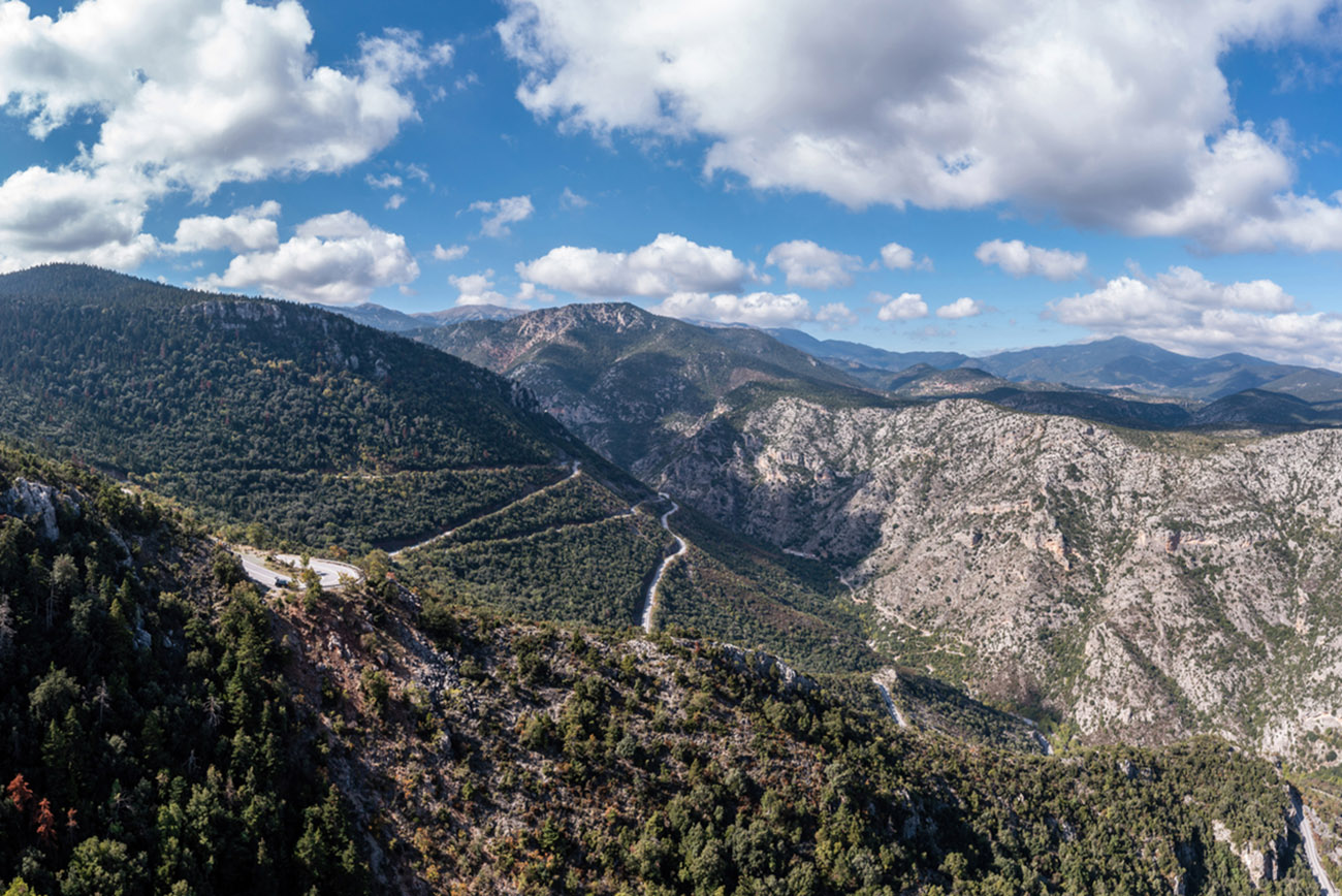 Parnonas, Parnon, Malevos mountain range, Peloponnese destination Greece. Aerial drone panoramic view of massif with forest, hiking, adventure.
