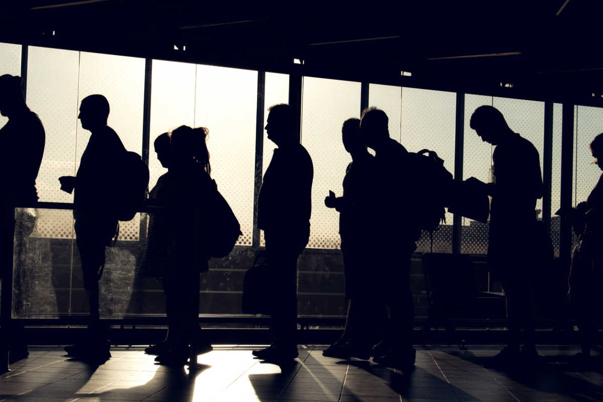 Istanbul, Turkey - August 27, 2015: People are waiting in the Ataturk Airport Terminal for boarding.