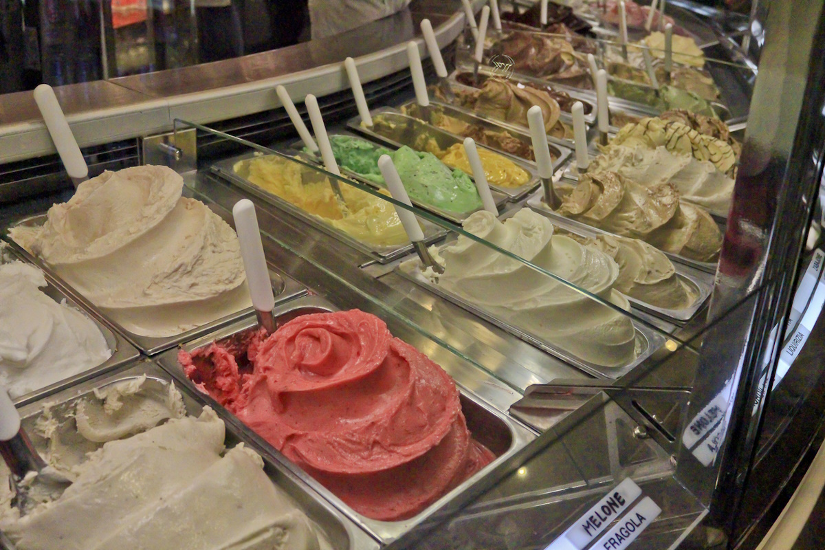 A variety of tastes and colors of the famous Italian ice cream displayed in a shop near the Pantheon in Rome.