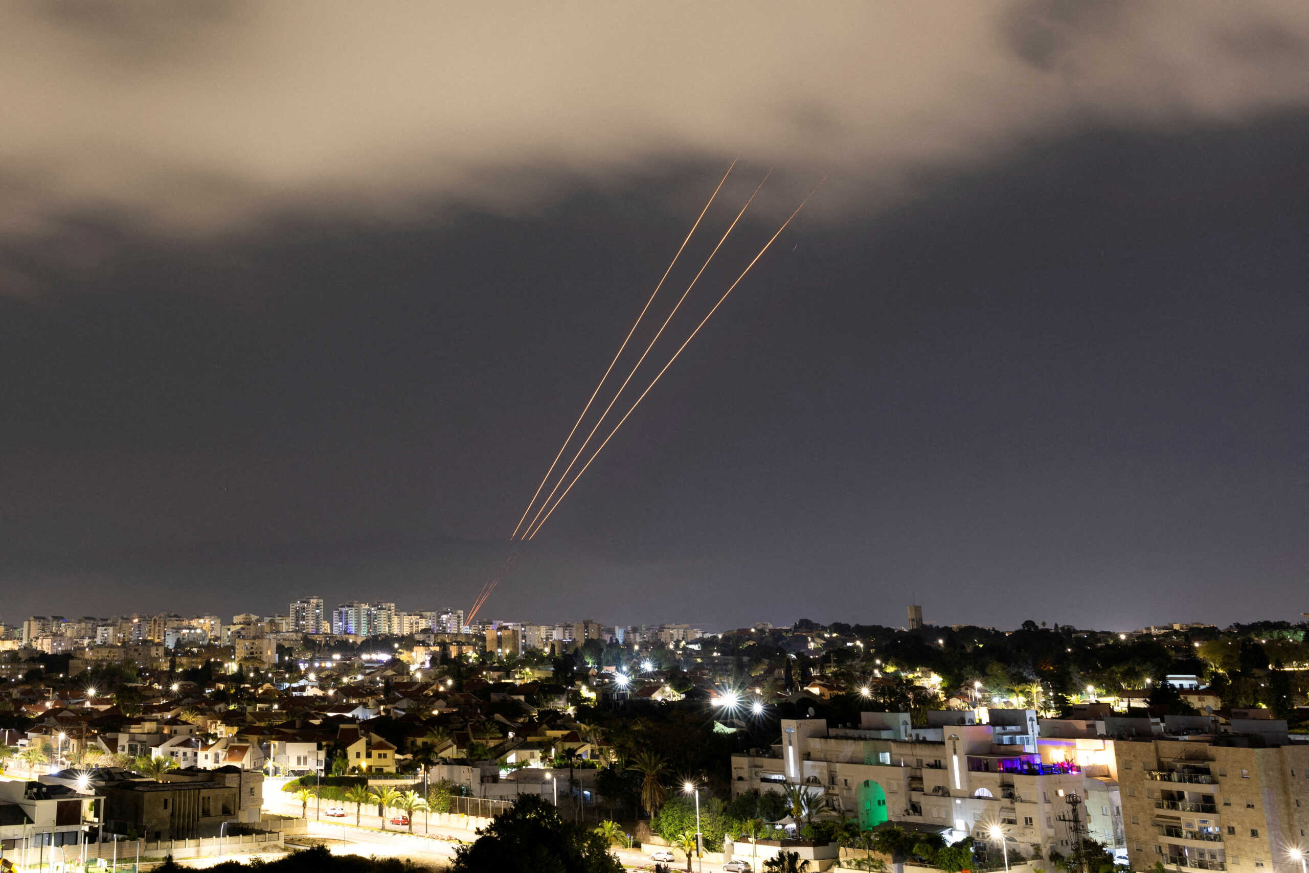 FILE PHOTO: An anti-missile system operates after Iran launched drones and missiles towards Israel, as seen from Ashkelon, Israel April 14, 2024. REUTERS