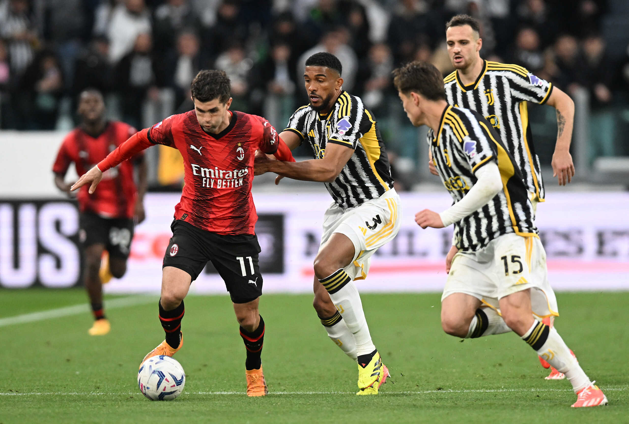 Soccer Football - Serie A - Juventus v AC Milan - Allianz Stadium, Turin, Italy - April 27, 2024 AC Milan's Christian Pulisic in action with Juventus' Bremer REUTERS